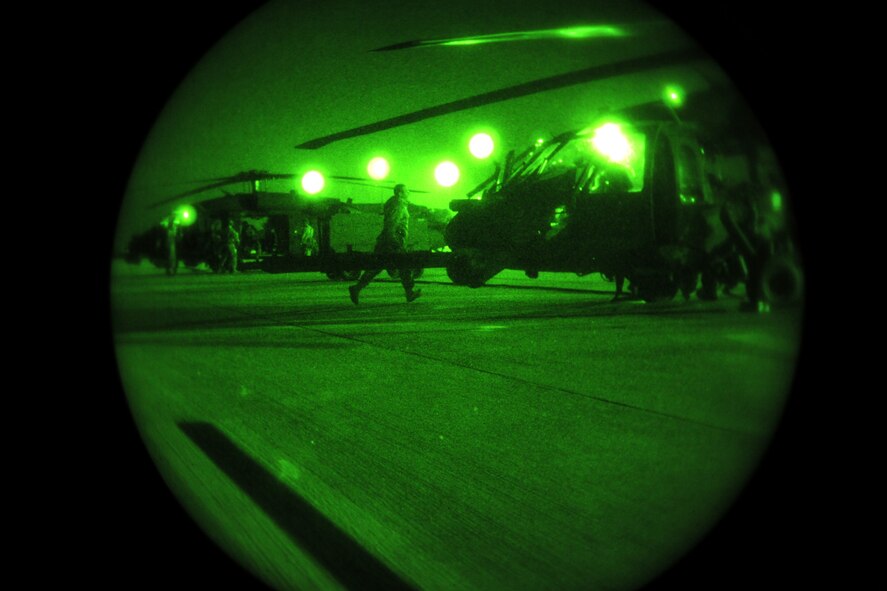 MOODY AIR FORCE BASE, Ga.-- Two HH-60G Pavehawk helicopters from the 41st Rescue Squadron prepare for lift-off  to conduct a search and rescue mission Jan. 15. Each Pavehawk was loaded with pararescueman from the 38th RQS to aid local authorities with the search for a missing local teenager. (U.S. Air Force photo/Airman 1st Class Benjamin Wiseman)(RELEASED)