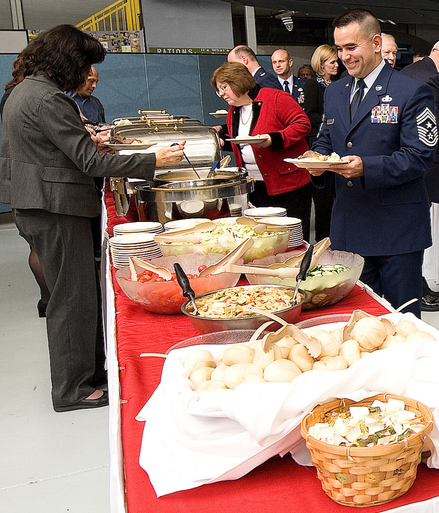 Attendees of the Dover Air Force Base, Del., 2011 Honorary Commanders Induction Ceremony partake in a buffet during the event Jan. 7, 2011. (U.S. Air Force photo/Jason Minto)