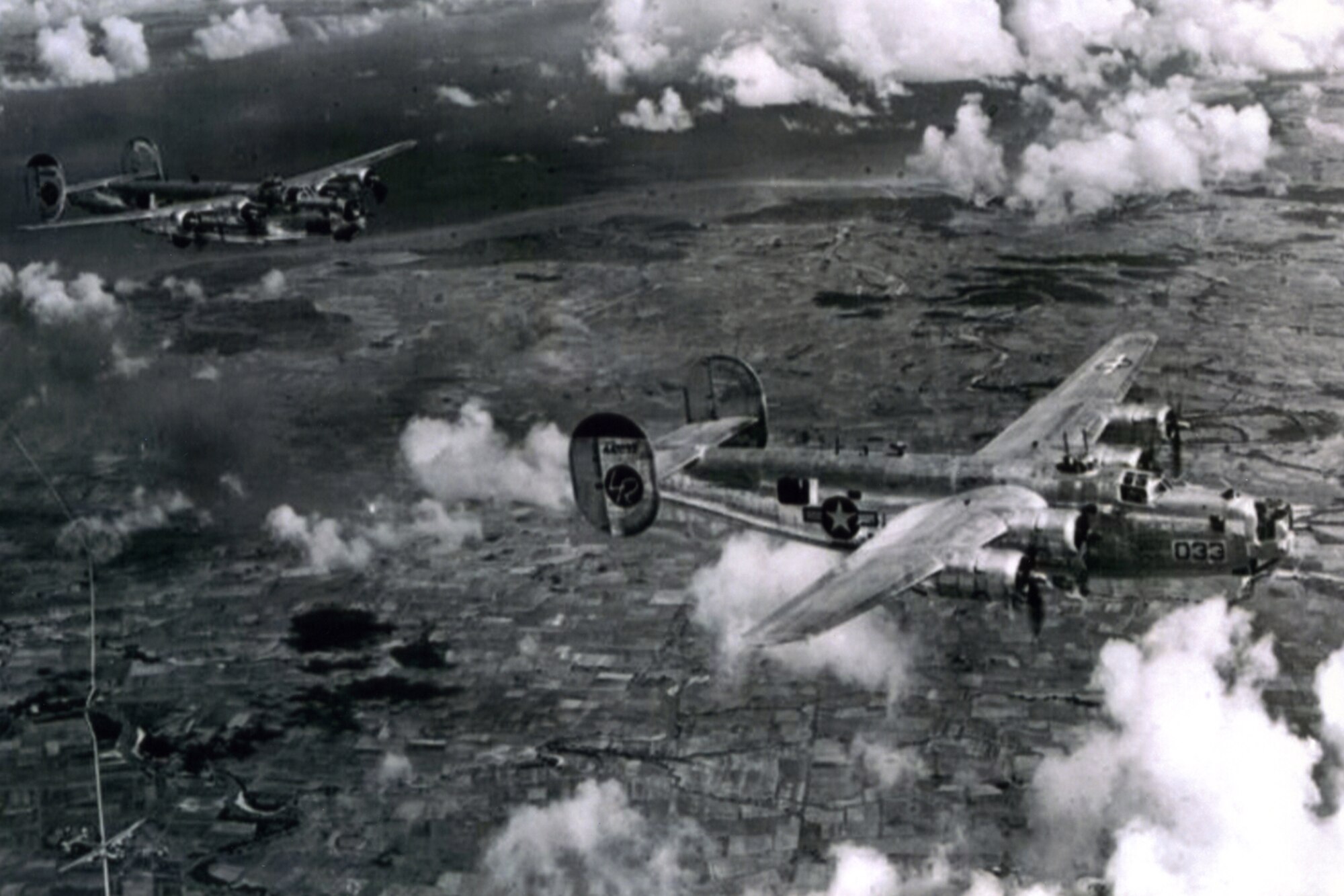 A formation of B-24s from the 307th Bomb Group takes to the skies during World War II.  Group bombers received their first taste of combat Dec. 27, 1942. Twenty-seven of the group's aircraft were deployed from Oahu to Midway Island. From here, the B-24s staged their first attack against an enemy fortress on Wake Island. The enemy was taken by surprise during the predawn raid. Before Japanese units responded with a barrage of anti-aircraft fire, 307th bombers had blasted 90 percent of the Wake Island stronghold. All the aircraft returned safely from what was considered the longest mass-raid of that time. It was from this mission that the 307th Bomb Group became known as “The Long Rangers”. (Courtesy photo)