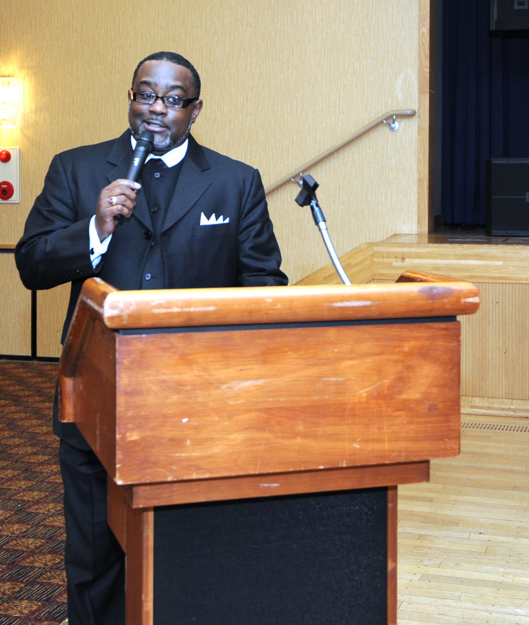 Bishop Shawn D. Smith of The First St. James Missionary Baptist Church, El Dorado, Arkansas speaks to members of The Misawa community during the Martin Luther King, Jr. luncheon at Misawa Air Base, Japan, Jan. 13, 2011. The ceremony featured words of inspiration from Bishop Smith on remember, celebrate and act ?a day on not a day off?. (U.S. Air Force photo by Tech. Sgt. Russell McBride/Released)