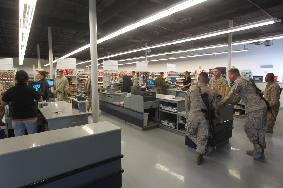 Marines training aboard the Combat Center at Enhanced Mojave Viper check out of the installation’s newest Marine Corps Exchange Jan. 19, 2011, during its first week of operation. Construction began last summer, with the grand opening taking place Jan. 14.