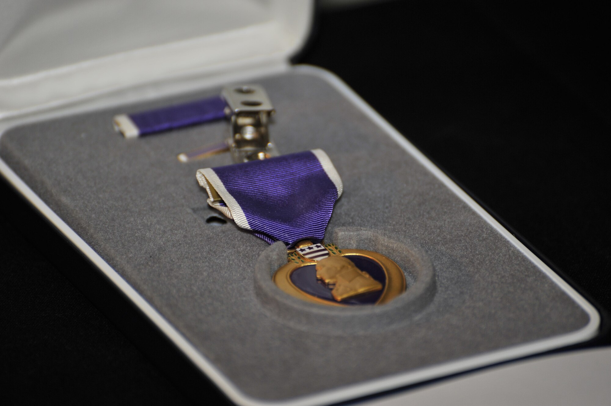 The Purple Heart is a United States military decoration awarded to those who have been wounded or killed while serving with the U.S. military. This Purple Heart was presented to Capt. Gil Wyche, a security forces officer assigned to the 966th Air Expeditionary Squadron, during a ceremony at Bagram Airfield, Afghanistan, on Jan. 19, 2011. (U.S. Air Force photo by Capt. Erick Saks)

