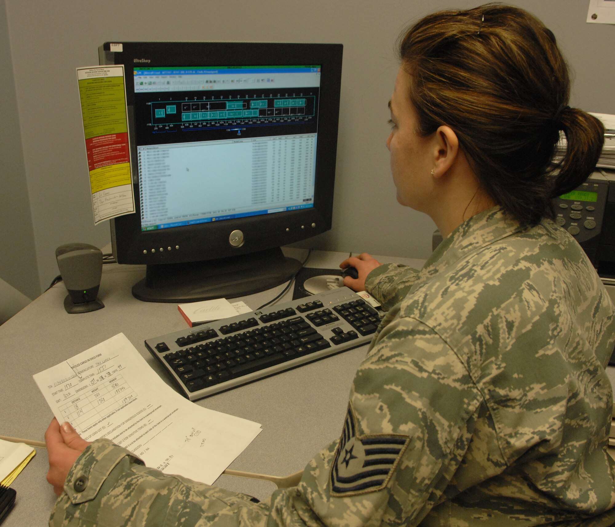 Tech. Sgt. Melita Roseboom reviews a load plan to ensure safety in-flight Jan. 19, 2011, Eielson Air Force Base, Alaska. Each flight has a specific load plan to ensure the plane is balanced and safe to fly. Sergeant Roseboom is the 354th Logistics Readiness Squadron Air Terminal Operations NCO in charge. (U.S. Air Force photo/ Senior Airman Rachelle Coleman)