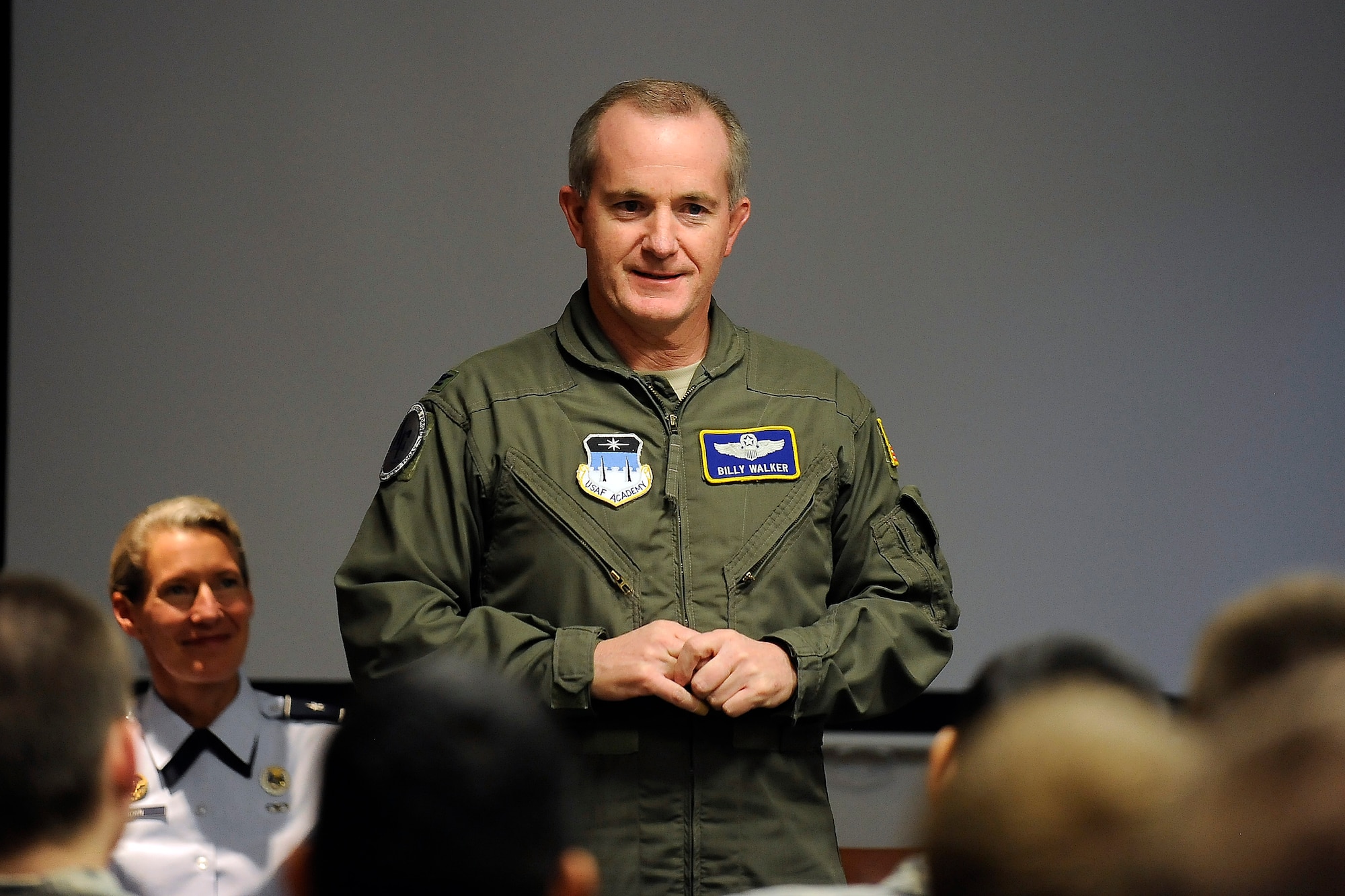 Col. Billy Walker talks to Airmen during a Leaders Encouraging Airmen Development briefing at the Air Force Academy Jan. 13, 2011. LEAD allows single Airmen between 17 and 23 years old to apply to become cadets at the Academy. Colonel Walker is the Academy's deputy director of athletics. (U.S. Air Force photo/Rachel Boettcher)