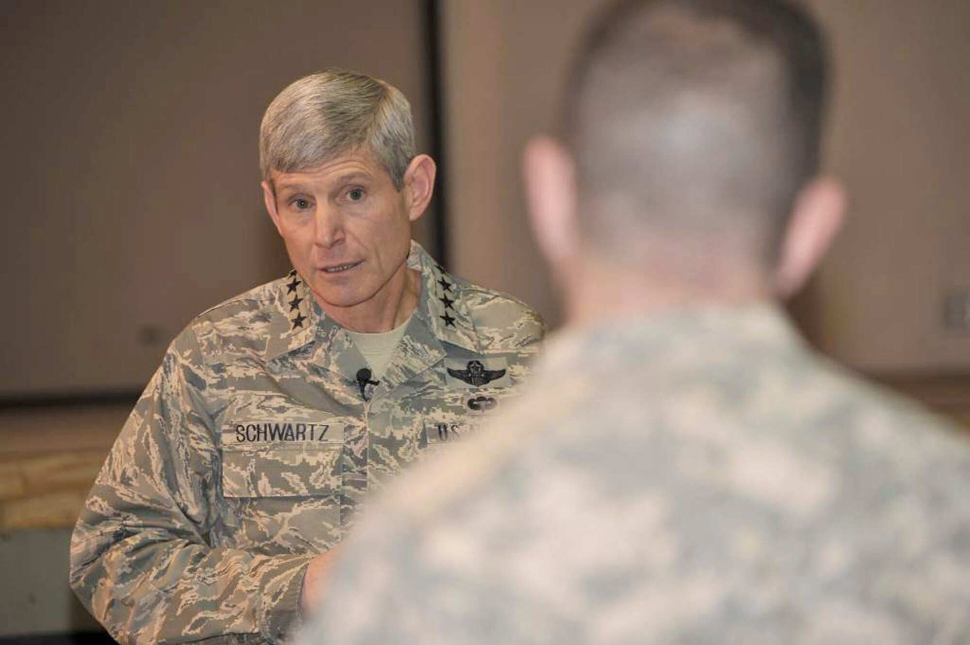 Air Force Chief of Staff Gen. Norton Schwartz answers a question during an "all call" Jan. 19, 2011, at Bagram Airfield, Afghanistan. General Schwartz talked about his vision for the Air Force and answered questions from Airmen. (U.S. Air Force photo)