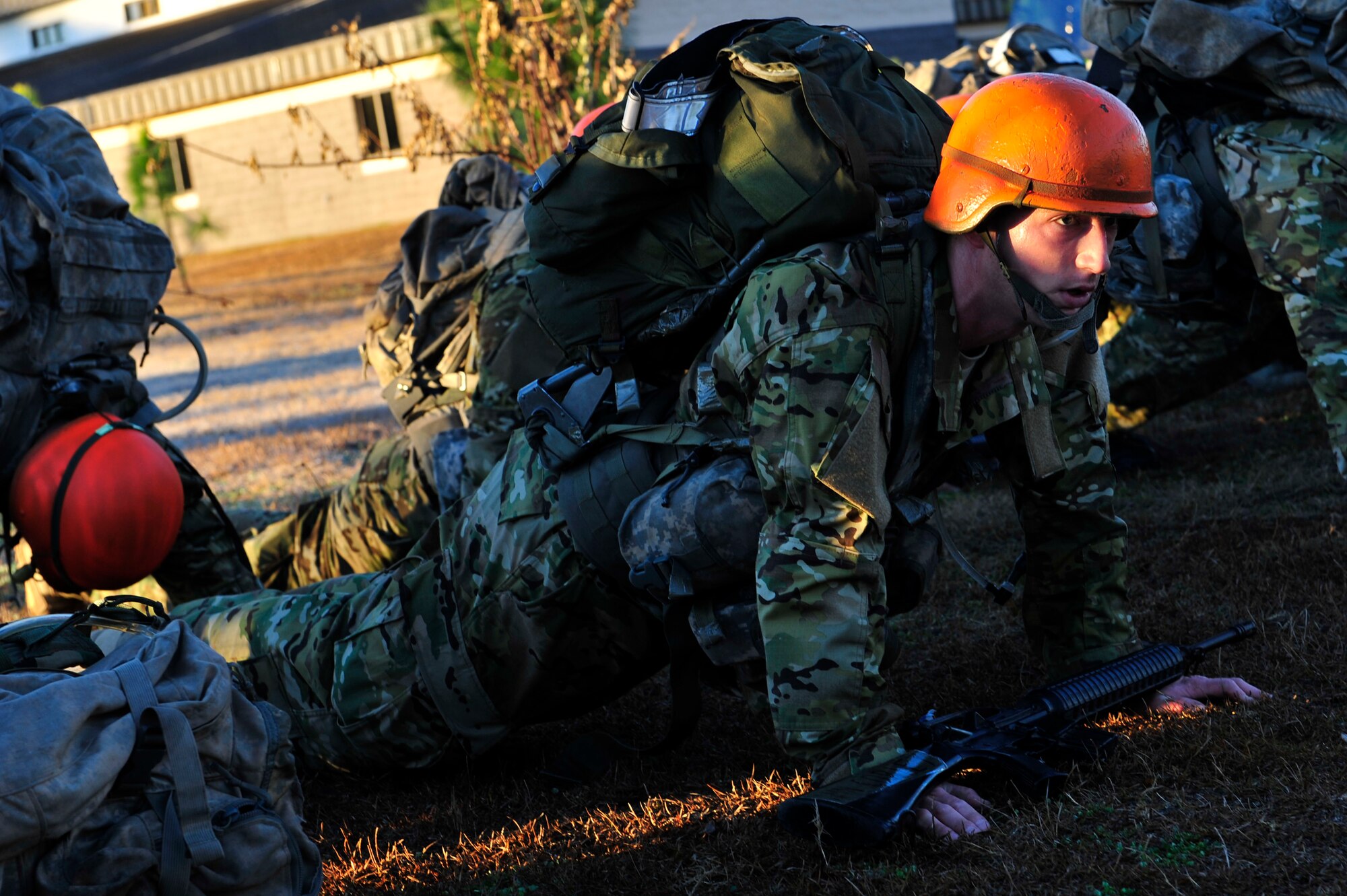 U.S. Air Force Tactical Air Control Party candidates spend some time in the forward leaning rest position for not following their instructor’s orders during their first ruck march, Hurlburt Field, Fla., Jan. 7, 2011. The TACP technical training school involves rigorous academic and physical training standards. TACPs establish and maintain command and control communications, control air traffic and naval gunfire and provide precision terminal attack guidance of U.S. and coalition close air support. (U.S. Air Force photo by Staff Sgt. Stephanie Jacobs/RELEASED)

