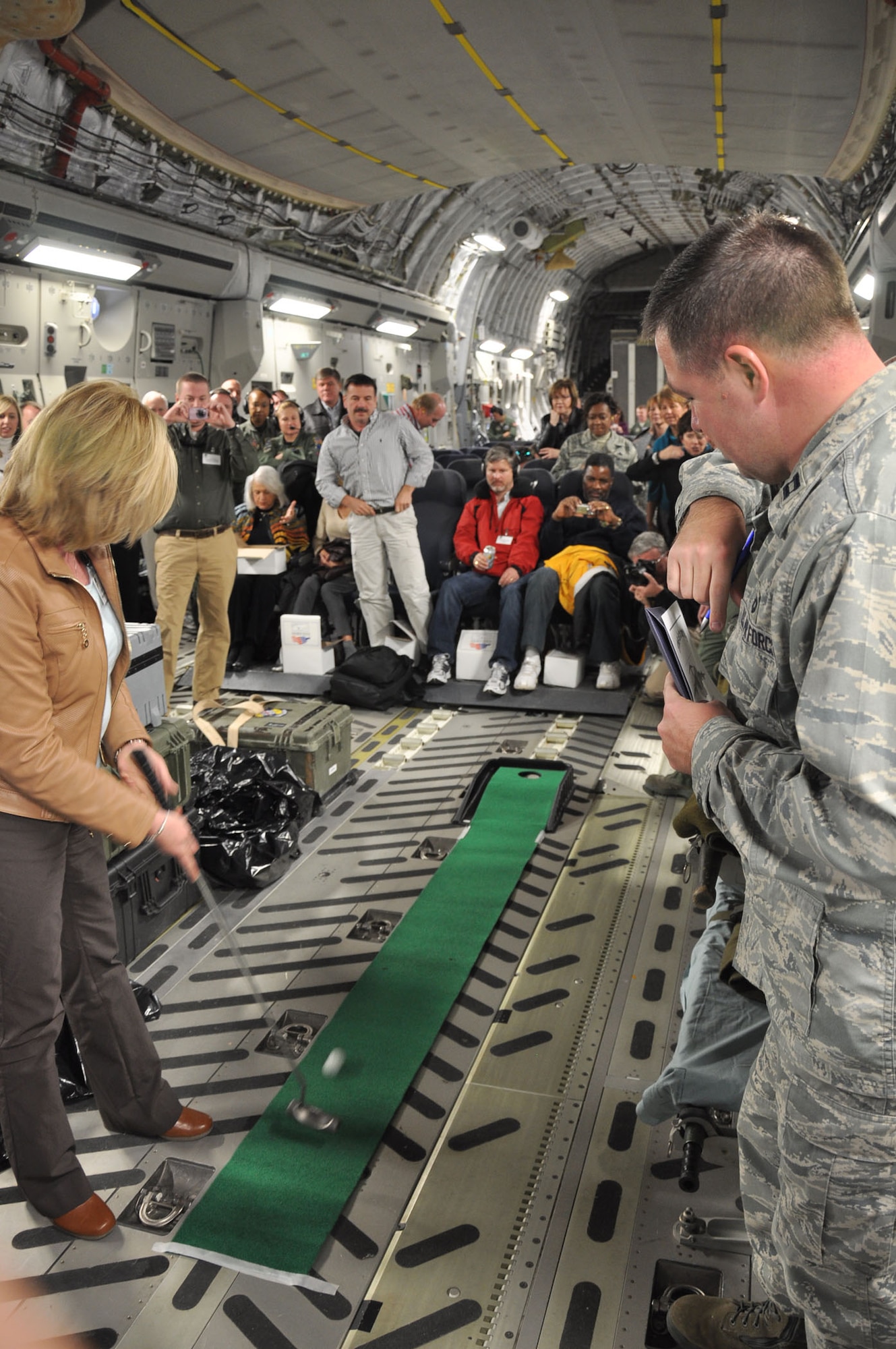 Civic leaders from the 315th Airlift Wing, Joint Base Charleston, S.C. and 919th Special Operations Wing, Duke Field, Fla. join flight crew and leadership during a two-day training mission and tour of Nellis AFB, Nev. Jan. 13-14, 2011. Civic leader tours provide the opportunity for the USAF Reserve to show employers and members of the community the talents and skills reservists posses while performing their missions locally and globally. (U.S. Air Force photo/Capt. Wayne Capps)