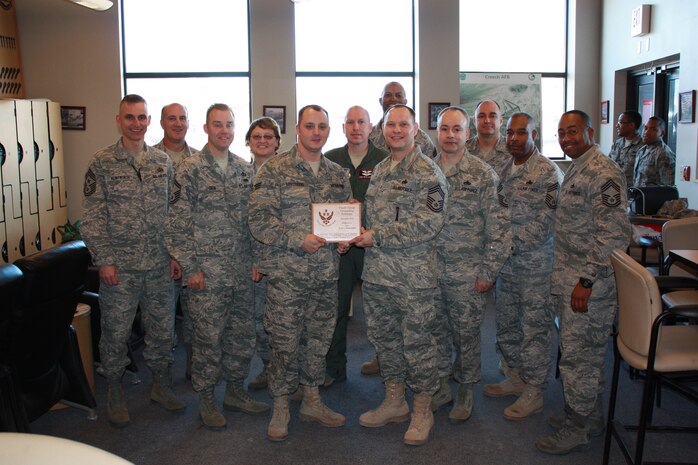 Senior Airman Kyle L. Makemson, 42nd Attack Squadron senior mission intelligence coordinator, was presented with the Nellis and Creech Air Force Bases' Chiefs' Group Excellence in Action Award for his top performance during November 2010. (Courtesy photo) 