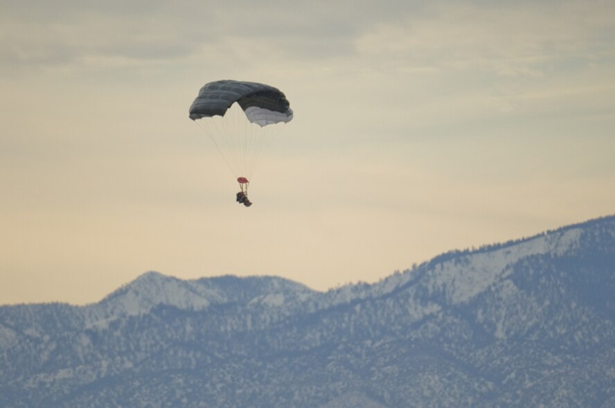 Members of the 418th Flight Test Squadron perform tests on an experimental parachute system called the Guardian Angel Advance Parachute System. These GAAPS system tests involve fixing the parachute system to a dummy, which will range in weight from 250 to more than 400 pounds, depending on the weight each test requires. The system is designed to take the place of the current one, which was originally created in the 1960s. (U.S. Air Force photo/Rob Densmore) 
