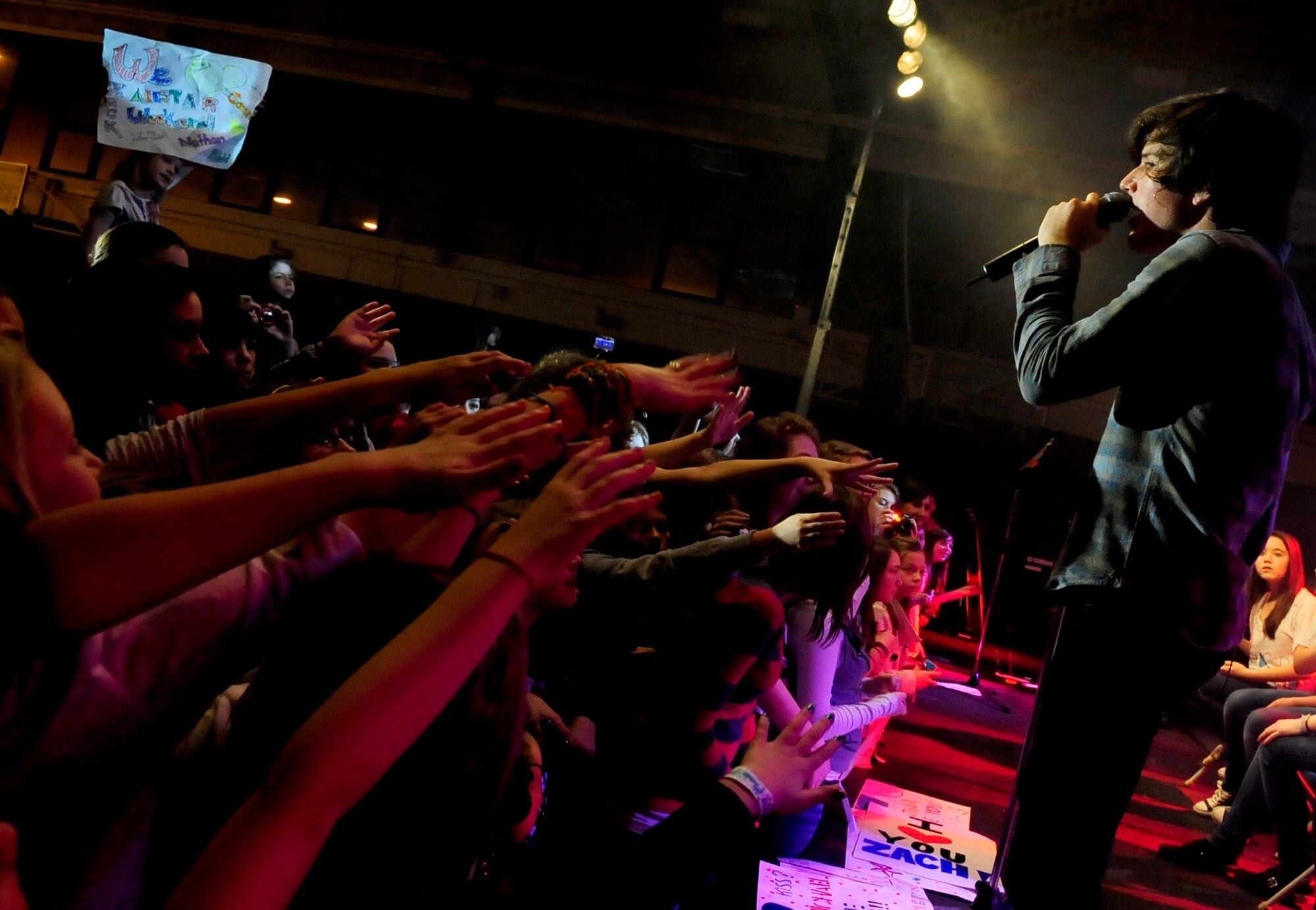 RAF MILDENHALL, England -- Zachary Porter, Allstar Weekend lead singer, sings to an excited crowd here Jan. 15, 2011. The band gave RAF Mildenhall and the other surrounding bases a family-friendly zone to enjoy themselves without costing a dime. (U.S. Air Force photo/Senior Airman Ethan Morgan)
