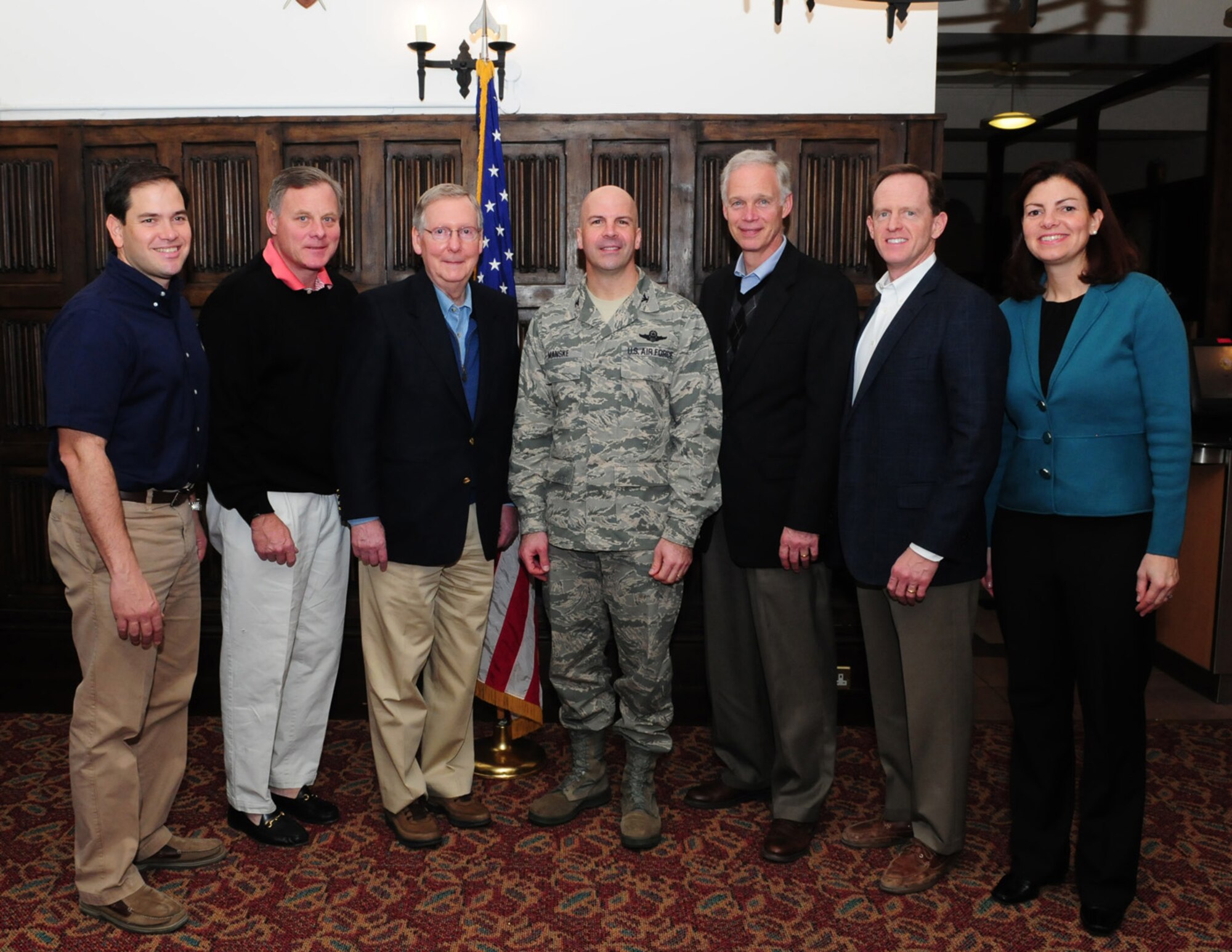 RAF MILDENHALL, England -- Six senators and Col. Chad Manske (center) 100th Air Refueling Wing commander, had breakfast with Airmen at the Gateway Dining Facility Jan. 18, 2011. The senators, who made a quick stop here after visiting deployed troops, are Sen. Marco Rubio, Fla.; Sen. Richard Burr, N.C.; Sen. Mitch McConnell, Ky.; Sen. Ron Johnson, Wis.; Sen. Pat Toomey, Pa., and Sen. Kelly Ayotte, N.H. (U.S. Air Force photo/Karen Abeyasekere)