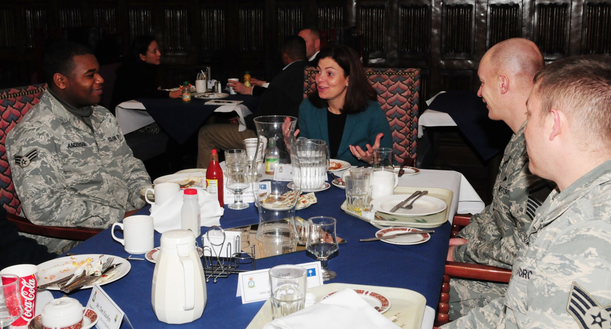 RAF MILDENHALL, England -- Sen. Kelly Ayotte, N.H., chats with military constituents from her state at breakfast Jan. 18, 2011, at the Gateway Dining Facility. Six senators made a stop at RAF Mildenhall on their way home from visiting deployed troops. (U.S. Air Force photo/Karen Abeyasekere)