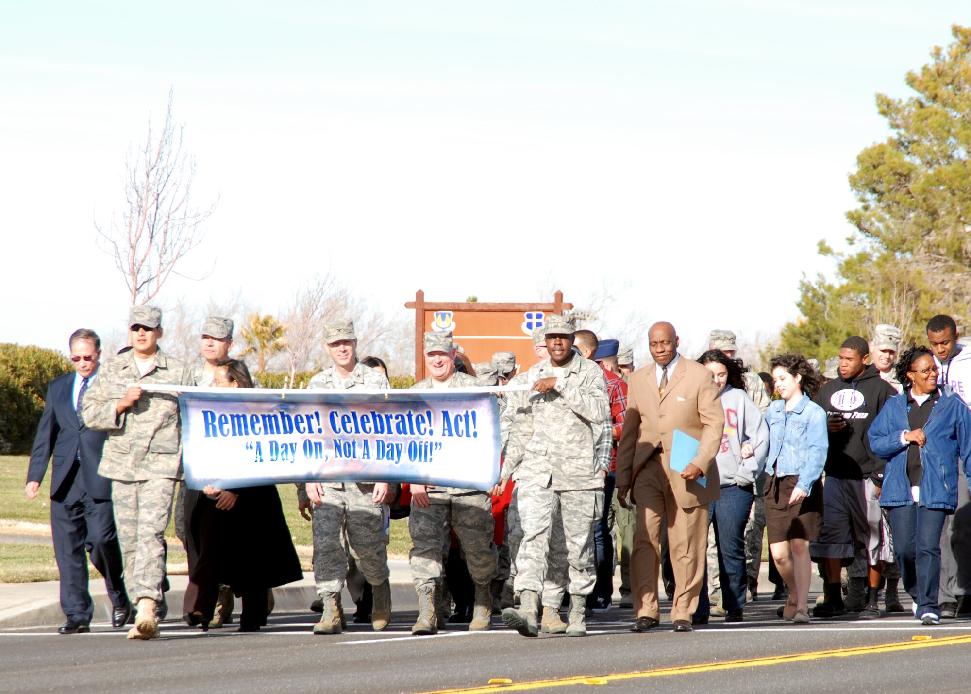 Dozens of Team Edwards members marched from 95th Air Base Wing's headquarters to Chapel 1 to celebrate the legacy of Dr. Martin Luther King Jr. Jan. 13. A commemorative service was held at Chapel 1 featuring gospel singers and guest speakers followed by refreshments. (Air Force photo by Kenji Thuloweit)