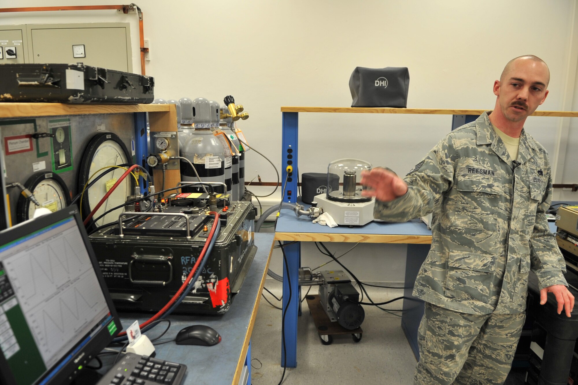 U.S. Air Force Staff Sgt. Stephen Reesman, 86th Maintenance Squadron Test Measurement and Diagnostic flight technician, gives familiarization training to maintenance members, Ramstein Air Base, Germany, Jan. 19, 2010. The flight consists of a scheduling section, shipping and receiving section, administration section and the Precision Measurement Equipment Laboratory (PMEL) and services customers throughout United States Air Forces in Europe, United States Central Command, and United States Africa Command. (U.S. Air Force photos by Senior Airman Caleb Pierce)