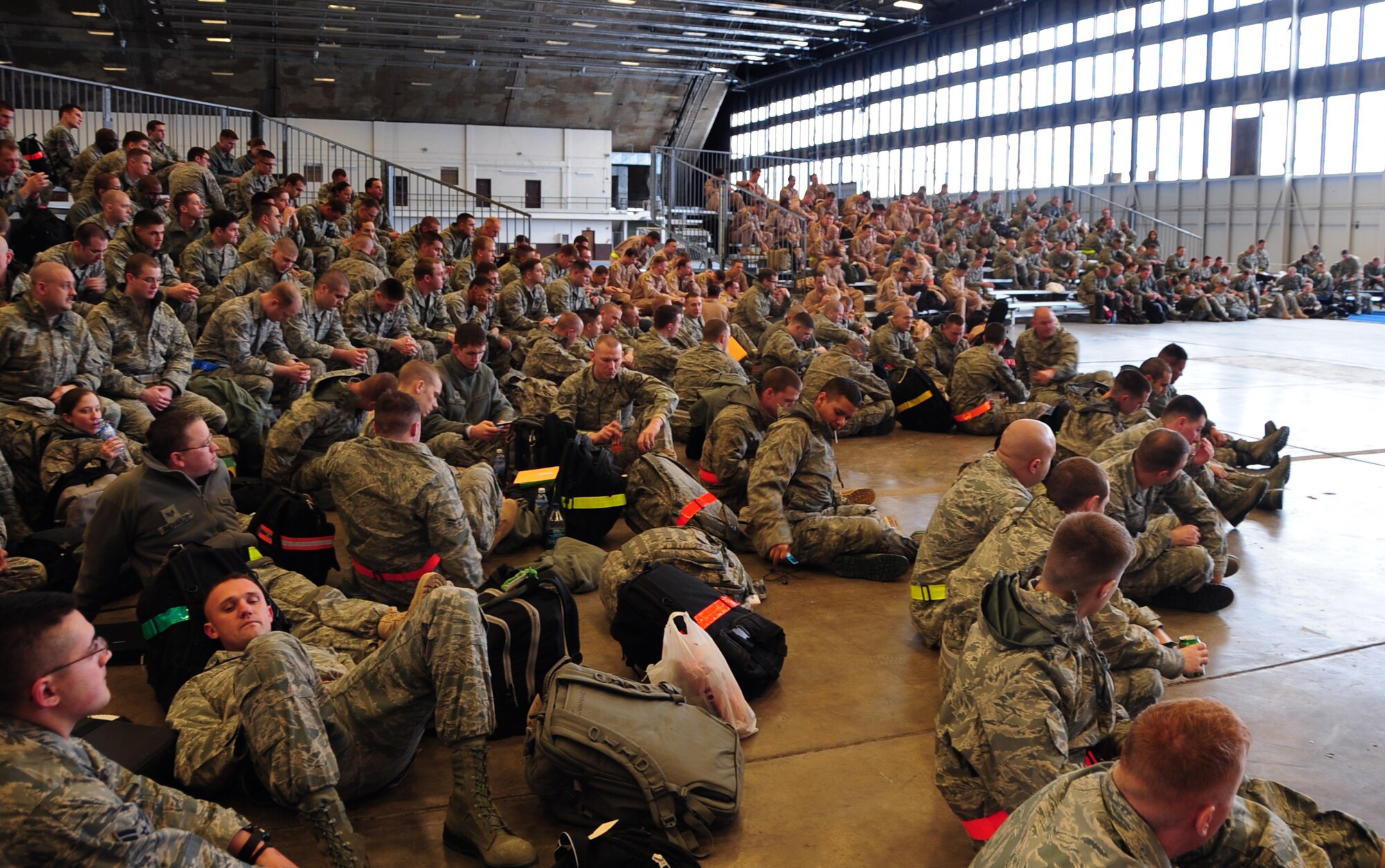Airmen from Ellsworth Air Force Base, S.D., wait for a variety of briefings before leaving for Southwest Asia, Jan. 15, 2011.  Approximately 300 Airmen deployed in support of overseas contingency operations. (U.S. Air Force photo/Senior Airman Anthony Sanchelli)
