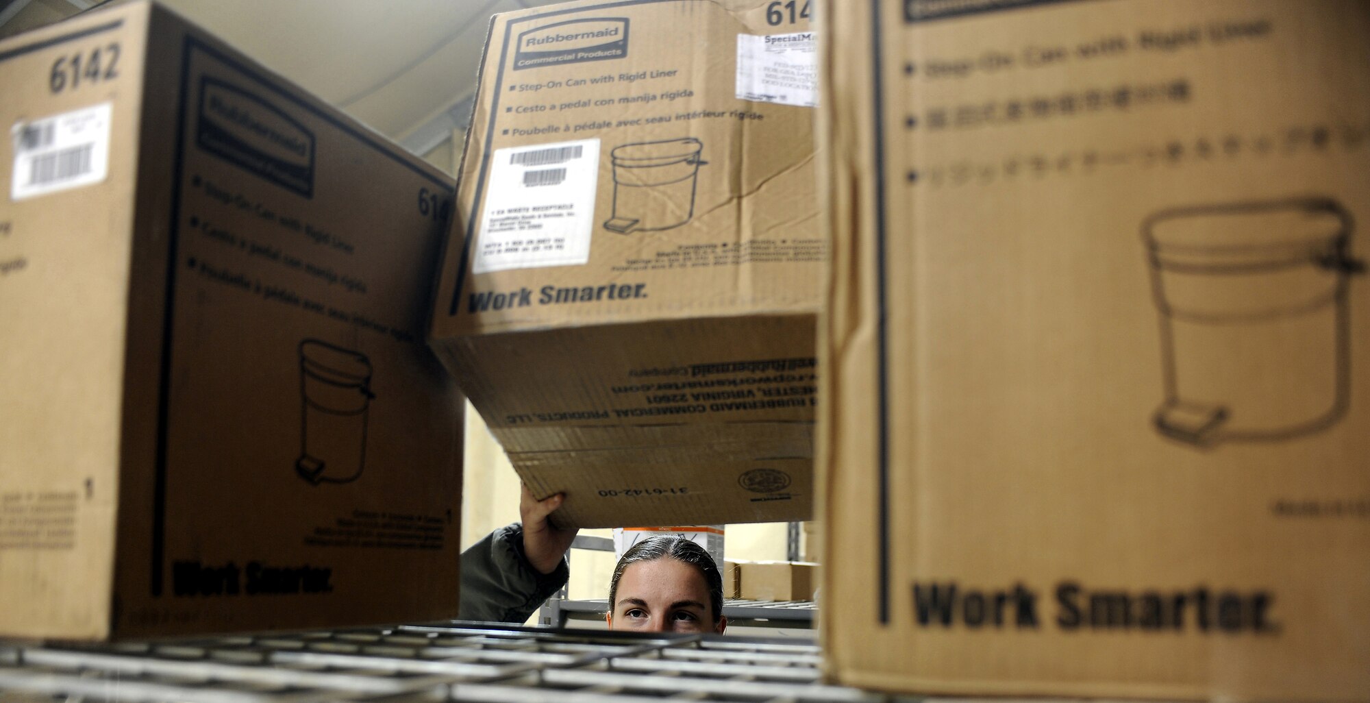 Staff Sgt. Francesca McCarthy transfers supplies from a pallet to a storage shelf Jan. 17, 2011, at Kandahar Airfield, Afghanistan. The 451st Air Expeditionary Logistics Readiness Squadron receives more than 50 pallets per week of supplies that are distributed out to designated units. Sergeant McCarthy is a customer service supervisor assigned to the 451st ELRS. (U.S. Air Force photo/Senior Airman Willard E. Grande II)