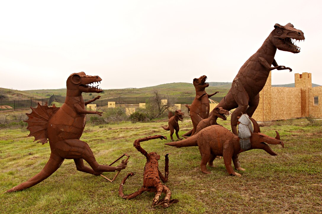 Dinosaurs stand tall to represent one of the themed areas, dinosaur land, at the new Camp Pendleton Paintball Park, which is scheduled to open Jan. 22. The new Mainside location will consist of 13 different themed areas for recreational paintball, and four tournament-style areas for advanced players.