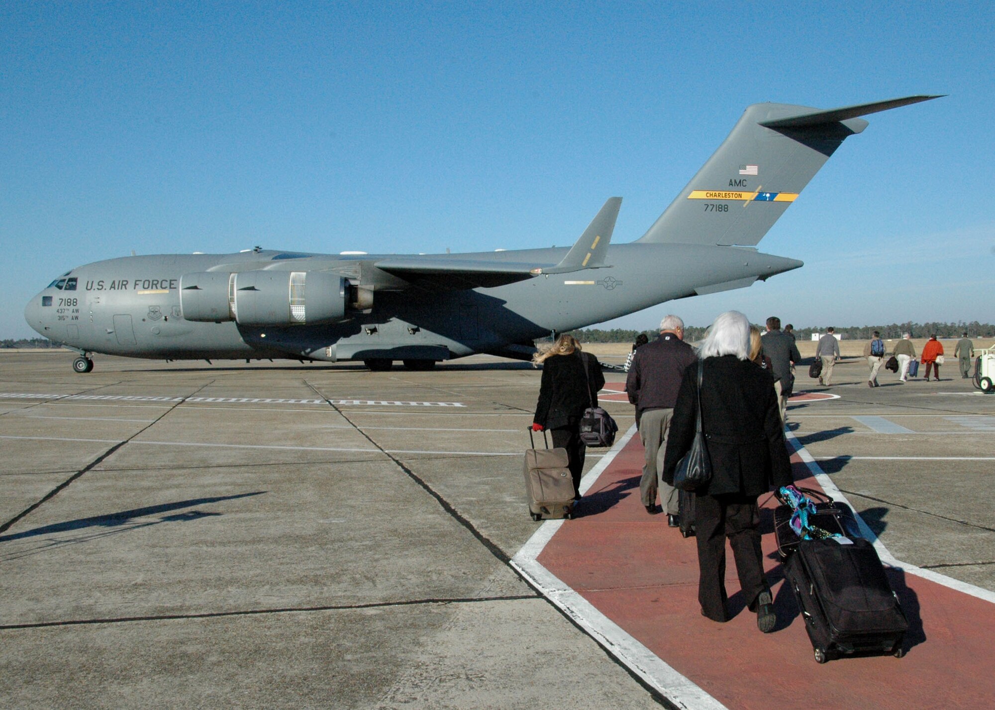 919th Special Operations Wing civic leaders embark on an Air Force Reserve C-17 from the 315th Airlift Wing, Joint Base Charleston, S.C., Jan. 13 on the Eglin Air Force Base flightline.  They joined their Charleston counterparts for a two-day civic leader tour to Nellis AFB, Nev.   Civic leader tours are an Air Force Reserve program designed to increase community leaders' awareness and understanding of reservists’ roles in national security by inviting them to witness their mission at various installations.  (U.S. Air Force photo/Dan Neely)