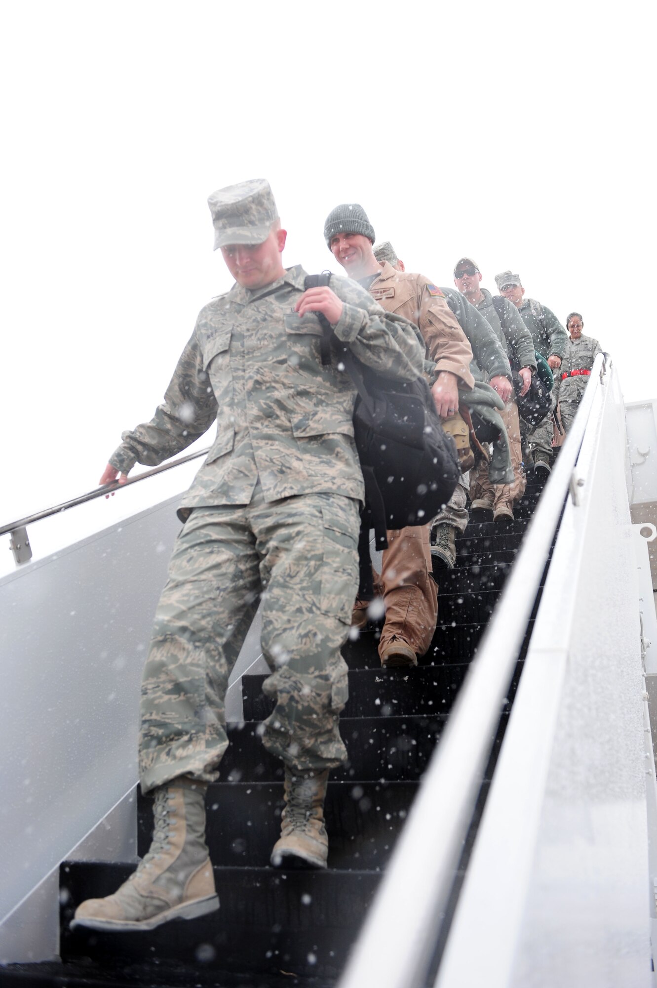 Team Little Rock members return home from deployment Jan. 20, 2011, at Little Rock Air Force Base, Ark. The Airmen returned from various deployed locations, like Afghanistan, Iraq and Kuwait. (U.S. Air Force photo by Senior Airman Jim Araos)