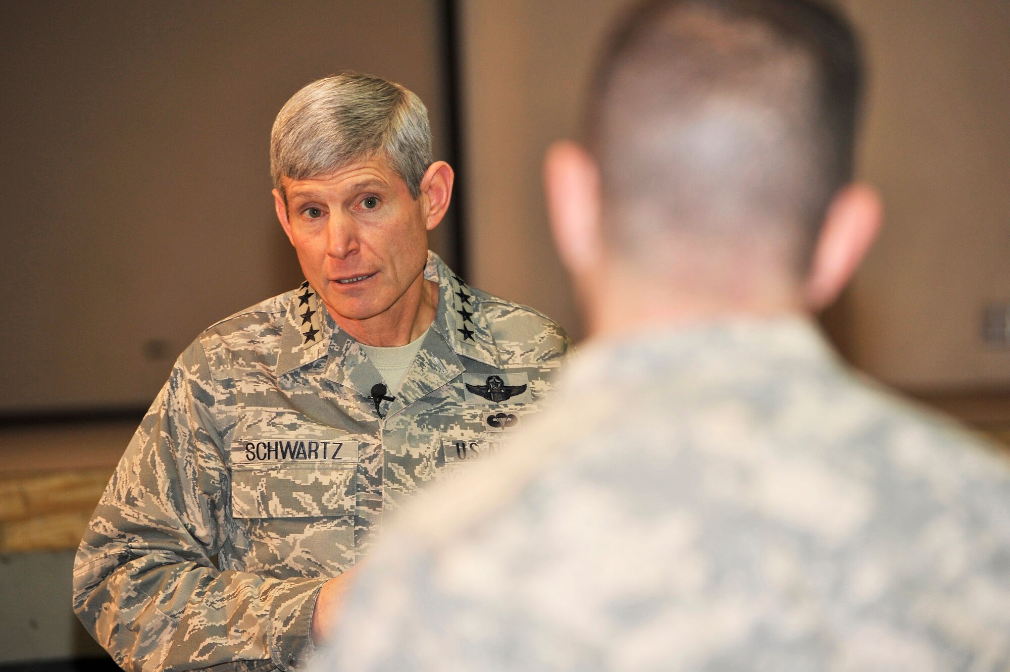 Air Force Chief of Staff Gen. Norton Schwartz answers a question Jan. 19, 2011, during an “all call” at Bagram Airfield, Afghanistan. General Schwartz talked about his vision for the Air Force and answered questions from Airmen.  (U.S. Air Force photo/Capt. Erick Saks)