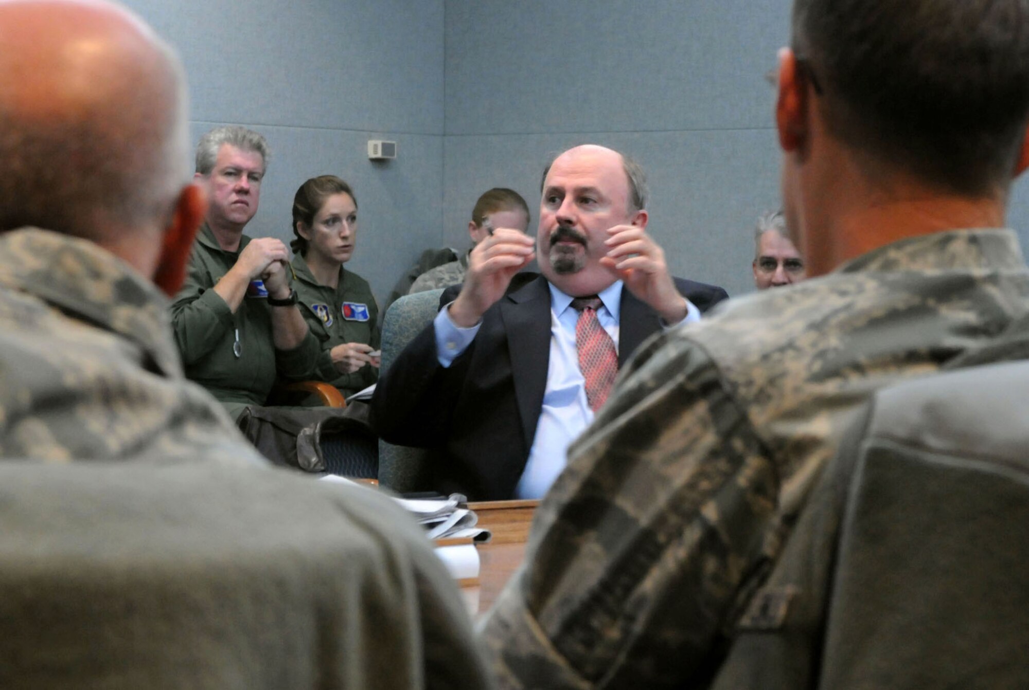 Thomas LaCrosse, director of Defense Support of Civil Authorities in the Office of the Assistant Secretary of Defense for Homeland Defense in America's Security Affairs, discusses issues concerning special missions in the Air Force Reserve Command. Airmen and aircraft from the 302nd Airlift Wing here, 403rd Wing, Keesler Air Force Base, Miss., and the 910th Airlift Wing, Youngstown Air Reserve Base, Ohio, convened Jan. 12-13, 2011, at Peterson AFB, Colo., for the first AFRC C-130 Special Missions conference. The conference was designed to share lessons learned, review policies and procedures, and tackle common support and wing issues involved with the aerial firefighting, weather reconnaissance and aerial spray missions. (U.S. Air Force photo/Capt. Marnee A.C. Losurdo)