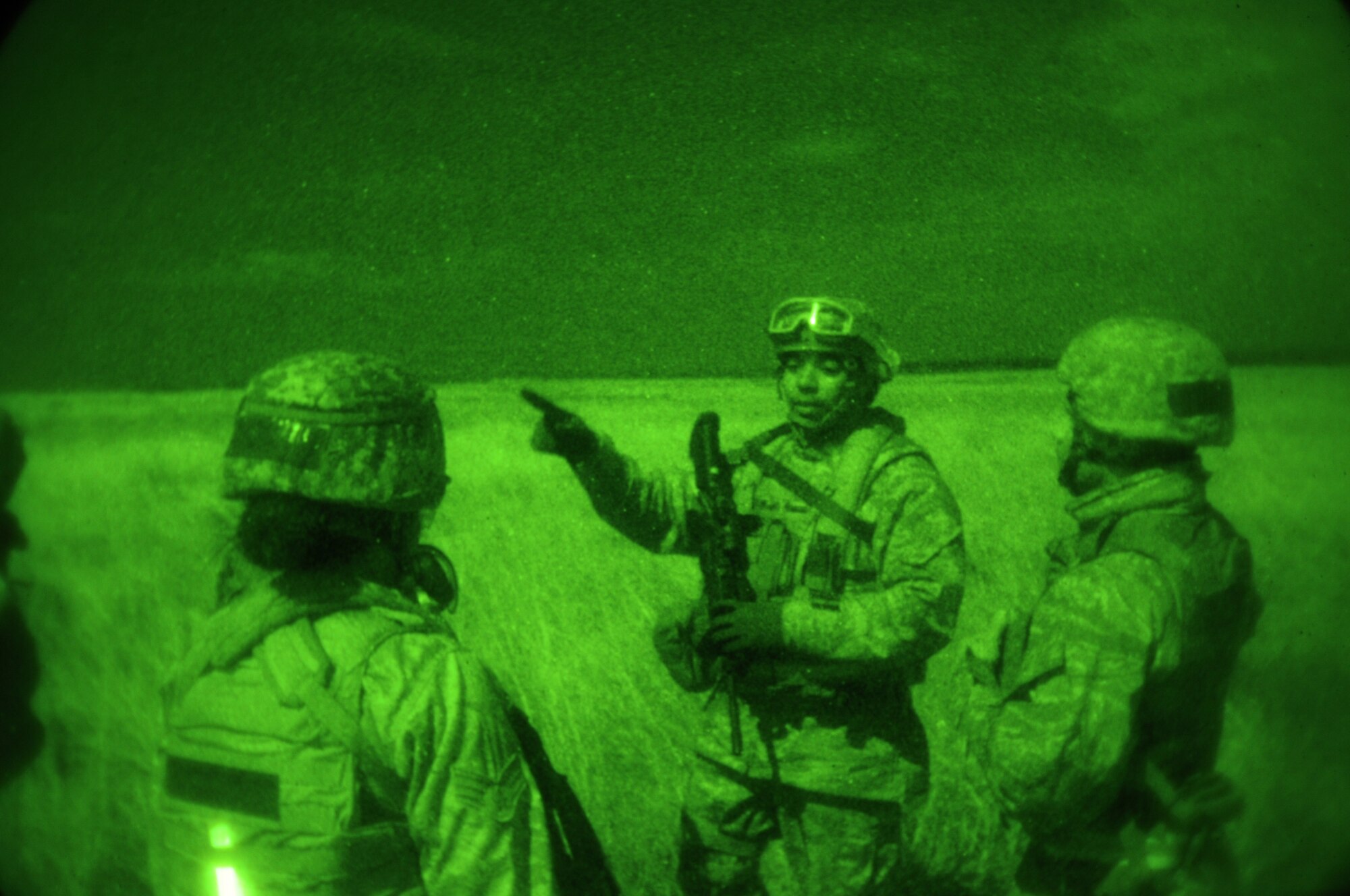 IE SHIMA AIRFIELD, Japan -- Staff Sgt. Julian Taylor, a fly-away security team leader with the 353rd Special Operations Support Squadron, briefs his team on the exfiltration procedures during an exercise to test the Security Forces Flight's ability to provide fly-away security for an aircraft and medical personnel at an airfield in "hostile" territory here Jan. 19 as part of Beverly High 11-02, a local operational readiness exercise. The scenario was the first time the Security Forces Flight tested their fly-away security capabilities during a local readiness exercise. Members of the 353rd Special Operations Group are participating in the exercise to hone their warfighting skills in preparation for a headquarters inspection next month. (U.S. Air Force photo by Tech. Sgt. Aaron Cram)