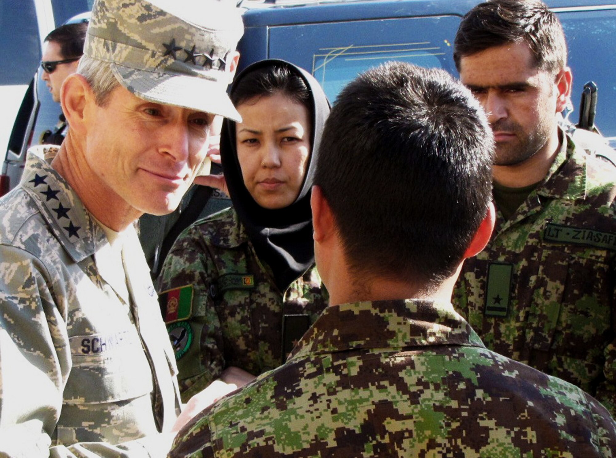 Air Force Chief of Staff Gen. Norton Schwartz talks to members of the Afghan air force during a visit to the English immersion lab known as "Thunder Lab" Jan.18, 2011, in Kabul, Afghanistan. (U.S. Air Force photo/Capt. Rob Leese)