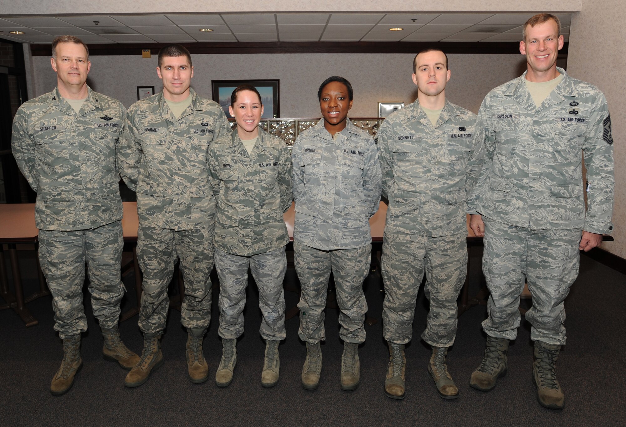 January’s Diamond Sharp Award recipients are (from left to right) Senior Airman Christopher Marmet, 319th Operations Support Squadron; Airman 1st Class Courtney Moya, 319th Air Refueling Wing; Airman 1st Class Lenae Gross, 319th Medical Operations Squadron; and Senior Airman Patrick Bennett, 319th Logistics Readiness Squadron. (U.S. Air Force photo by Staff Sgt. Suellyn Nuckolls)