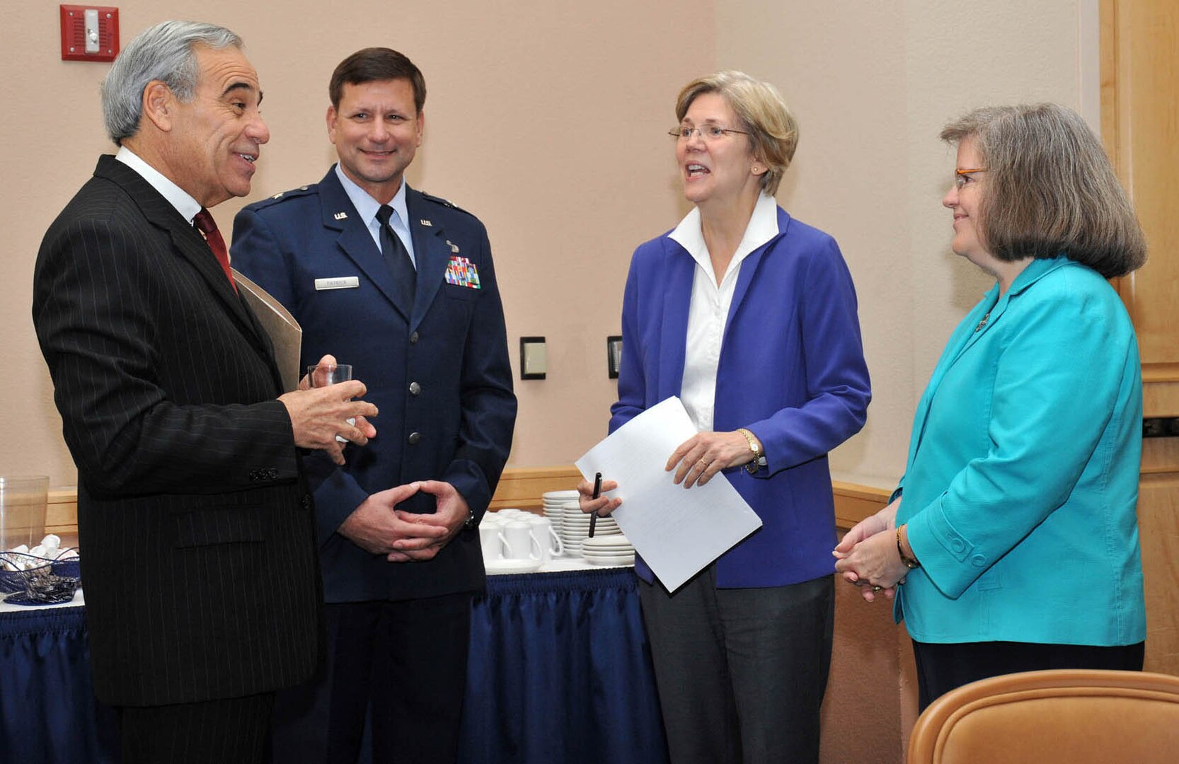 From left, U.S. Rep. Charlie Gonzalez of Texas and Air Force Brig. Gen. Leonard Patrick, 502nd Air Base Wing commander, meet with Elizabeth Warren and Holly Petraeus before a meeting with Joint Base San Antonio service members and their families at Lackland Air Force Base, Texas, Jan. 18, 2011. Ms. Warren is special advisor to the secretary of the treasury on the Consumer Financial Protection Bureau and Mrs. Petraeus is team lead of the bureau’s Office of Servicemember Affairs.  (U.S. Air Force photo/Alan Boedeker)