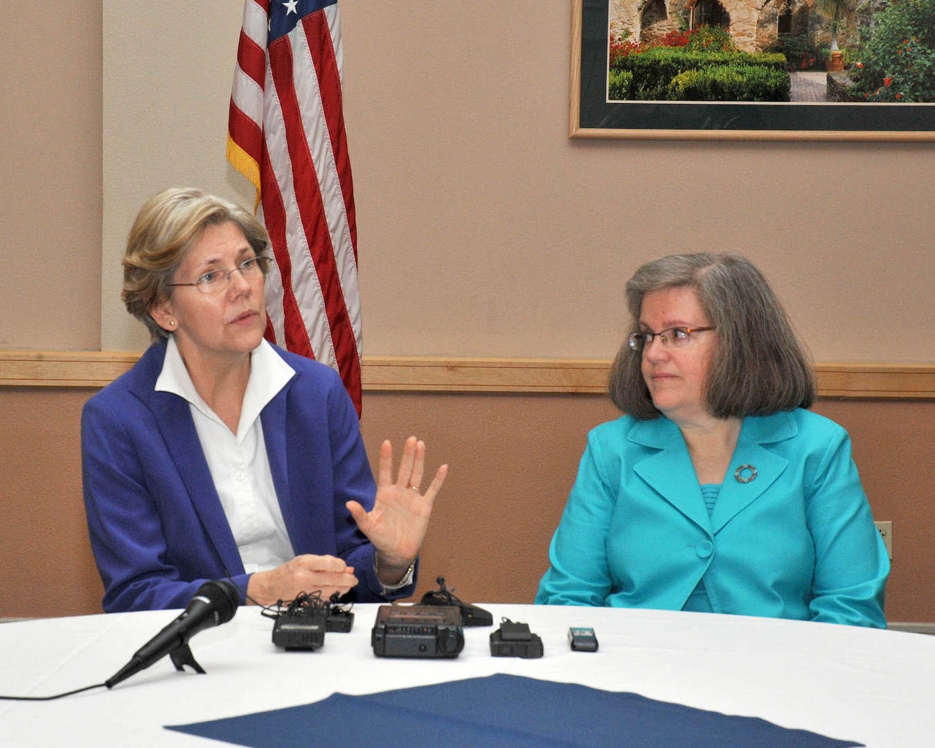Elizabeth Warren (left), special advisor to the secretary of the treasury on the Consumer Financial Protection Bureau, and Holly Petraeus, team lead of the bureau’s Office of Servicemember Affairs, conduct a news conference Jan. 18, 2011, at Lackland Air Force Base, Texas. The news conference took place in conjunction with a meeting with members of the Joint Base San Antonio community to discuss the unique financial issues facing military families.  (U.S. Air Force photo/Alan Bodeker)