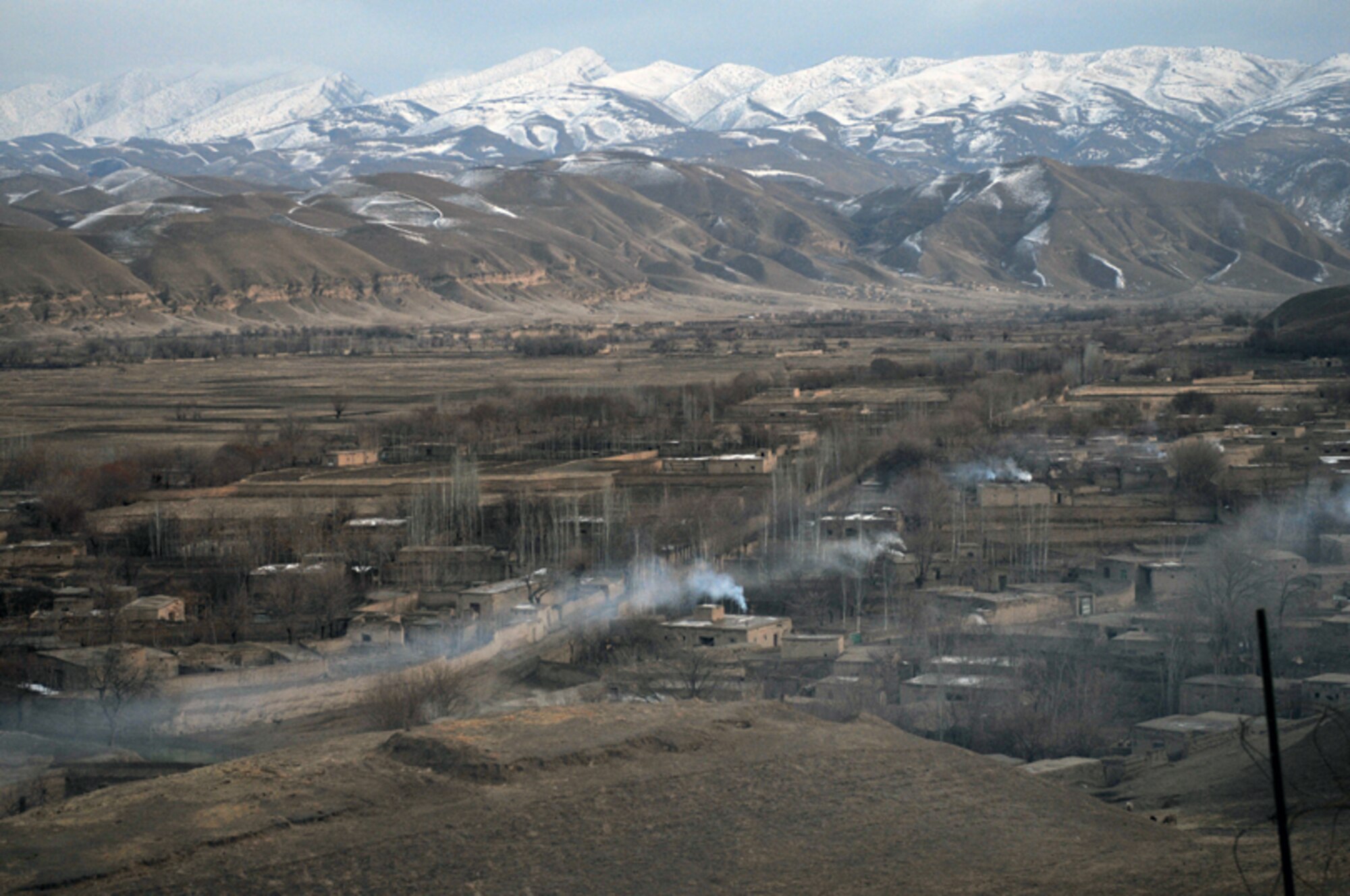 BADGHIS, Afghanistan -- Observation Post Cougar overlooks villages and Combat Outpost Delorean in the Bala Murghab Valley, Badghis Province, Afghanistan. Army scouts and Afghan National Army soldiers continue to hold the high ground Jan. 18, 2011, in southern Bala Murghab at OP Cougar. (U.S. Air Force photo/Tech. Sgt. Kevin Wallace)