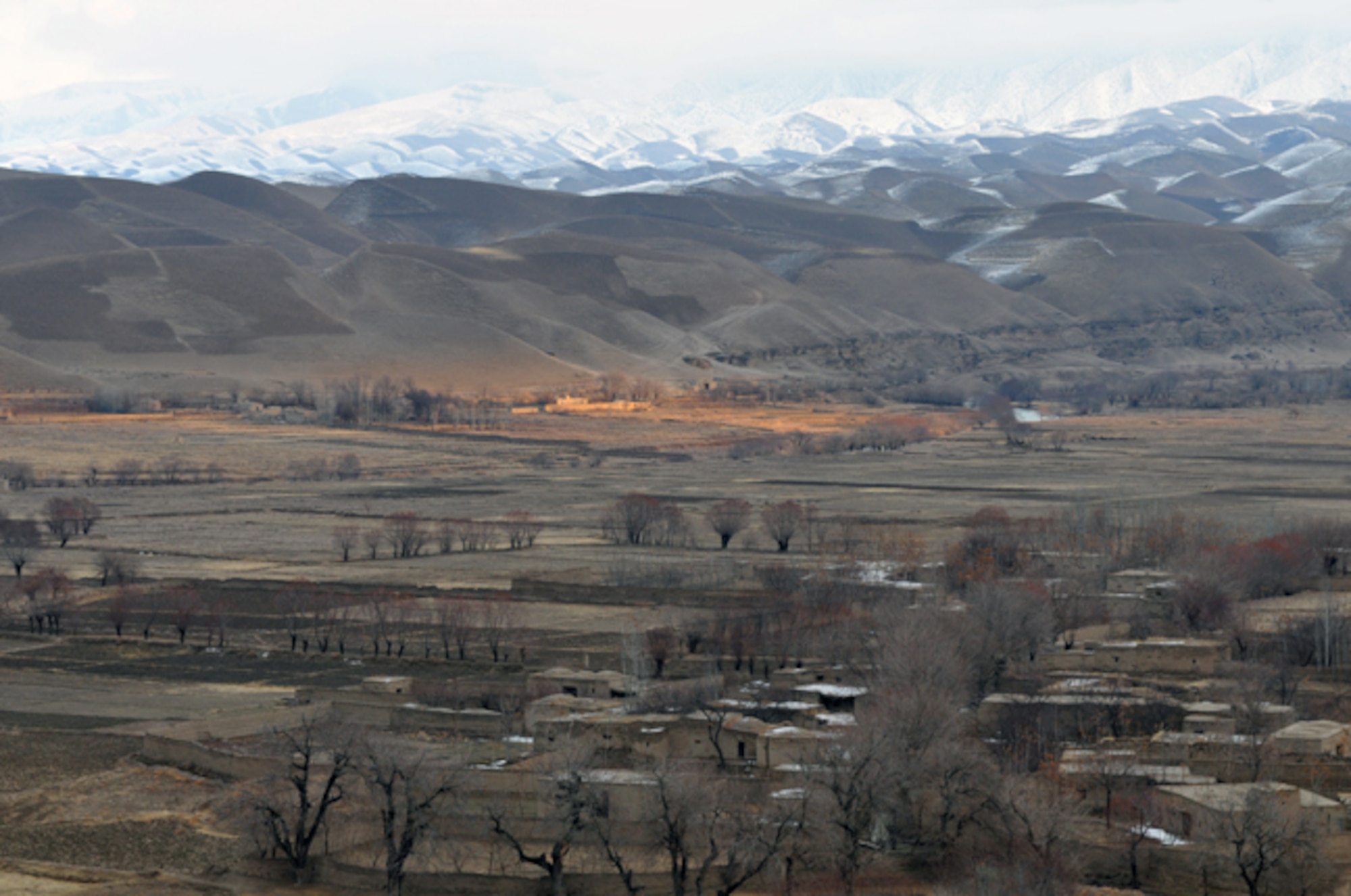 BADGHIS, Afghanistan -- Observation Post Cougar overlooks villages and Combat Outpost Delorean in the Bala Murghab Valley, Badghis Province, Afghanistan. Afghan National Army soldiers and U.S. Army scouts continue to hold the high ground Jan. 18, 2011 in southern Bala Murghab at OP Cougar. (U.S. Air Force photo/Tech. Sgt. Kevin Wallace)
