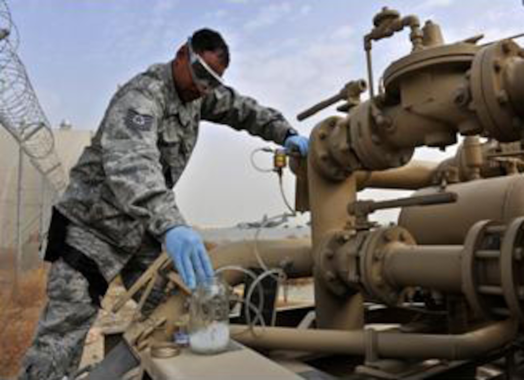 PACAF Fuels NCO of the Year, Tech. Sgt. Kerry Miller takes fuel samples to ensure warfighters downrange are receiving clean, dry, and serviceable fuel. (Courtesy photo)