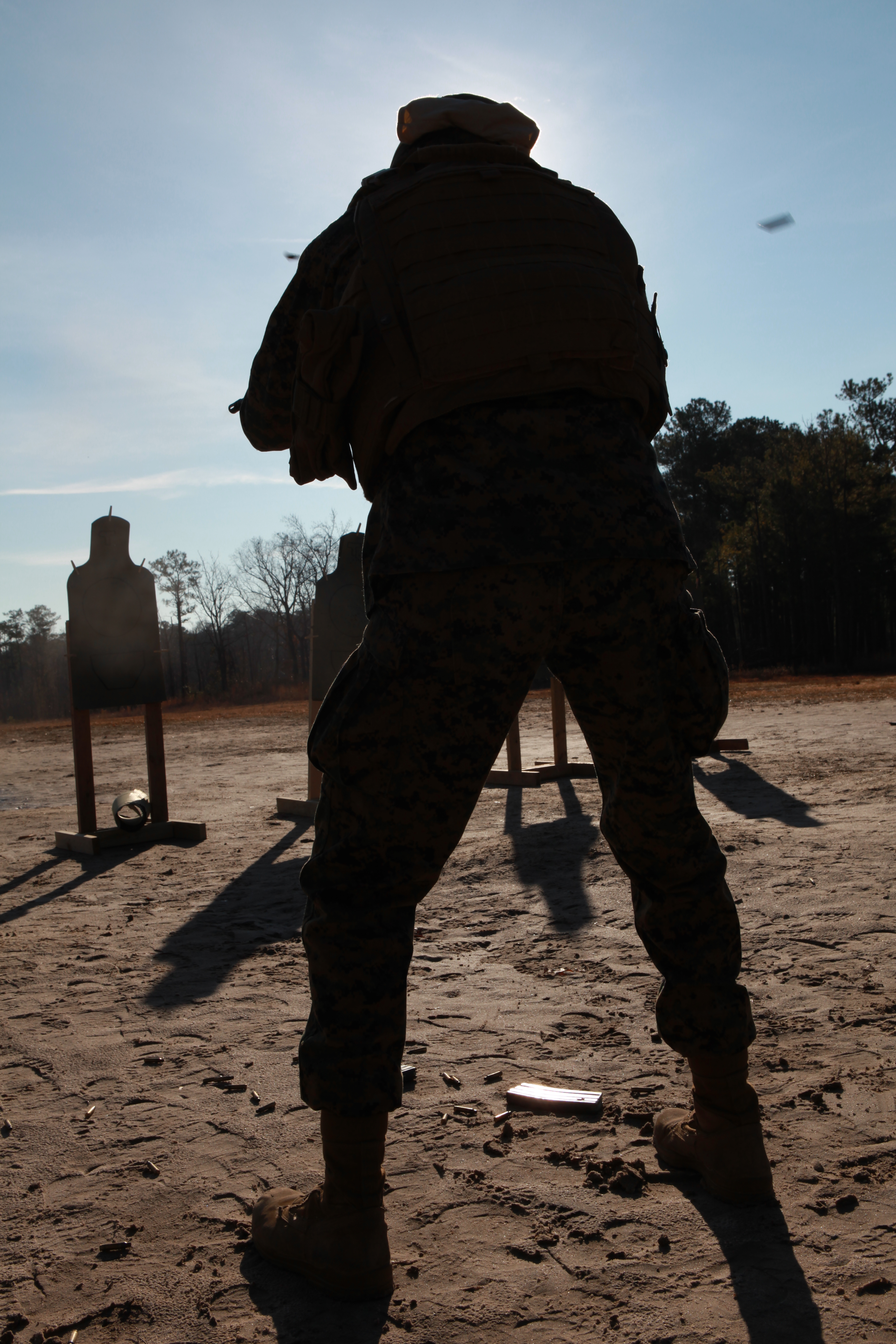 Lance Cpl. Charles M. Williams, a computer technician with the 24th Marine Expeditionary Unit, engages several targets with his rifle during a during a day of combat marksmanship training at range K406B on Camp Lejeune, N.C. Jan. 20. The 24th MEU conducted the training to sustain the combat marksmanship skills of the Marines and Sailors within the Command Element.