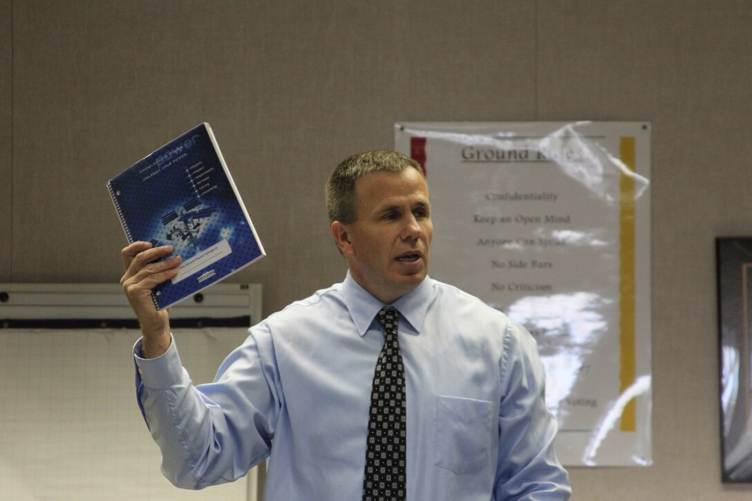 Morongo Unified School District’s Assistant Superintendent of Instructional Services Tom Baumgarten gives service members an orientation on the Adopt-a-School program. The Adopt-a-School programs is an opportunity for members of the Combat Center to volunteer their time to local schools.