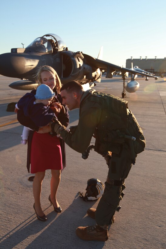 Capt. Michael R. Donlin, an AV-8B Harrier pilot with Marine Attack Squadron 542, greets his daughter Bailey and his wife Lexi upon his return to Cherry Point Jan. 21, after a six-month deployment with the 31st Marine Expeditionary Unit. Donlin, along with three additional pilots were among the last VMA-542 Marines to return from deployment with the 31st MEU. “It’s a great feeling to have everyone in one place,”  said Lt. Col. Joshua L. Luck, the commanding officer of VMA-542. “We overcame a lot of obstacles and supported a fair share of exercises over the past six and a half months.” The Marines of the 31st MEU supported exercises in Iwakuni, Japan, the Philippines, Singapore and Hong Kong.