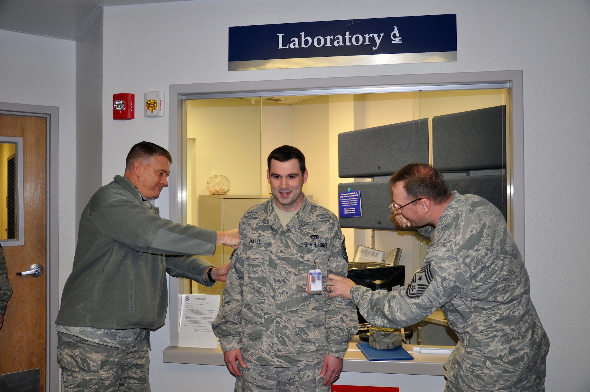 Colonel Greg Tims, 90th Missile Wing commander and CMSgt Marty Anderson, 90th MW command chief, made a surprise visit to promote Master (sel.) Sgt. Edward Mayle, 90th Medical Operations Squadron Jan. 13 as part of the stripes for exceptional performance recognition program. The promotion came directly from Air Force Global Strike Command in recognition of the Airman's outstanding performance on the job.