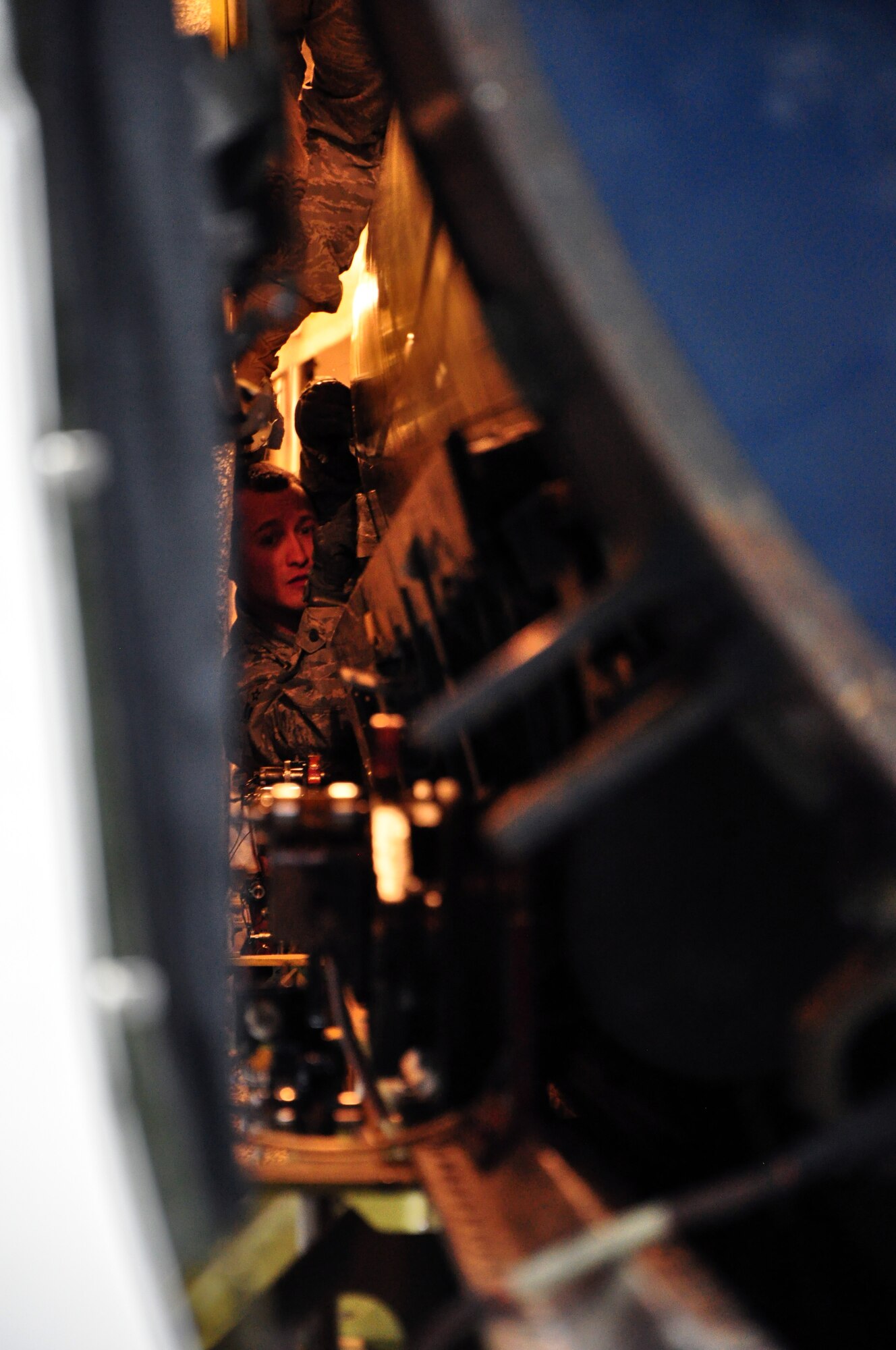 A member of 90th Missile Maintenance Squadron practices measuring procedures on a Minuteman III training missile. The missile rested in a transport vehicle during the mock START treaty inspection Jan. 13. (U.S. Air Force photo by Staff Sgt. Chad Thompson)