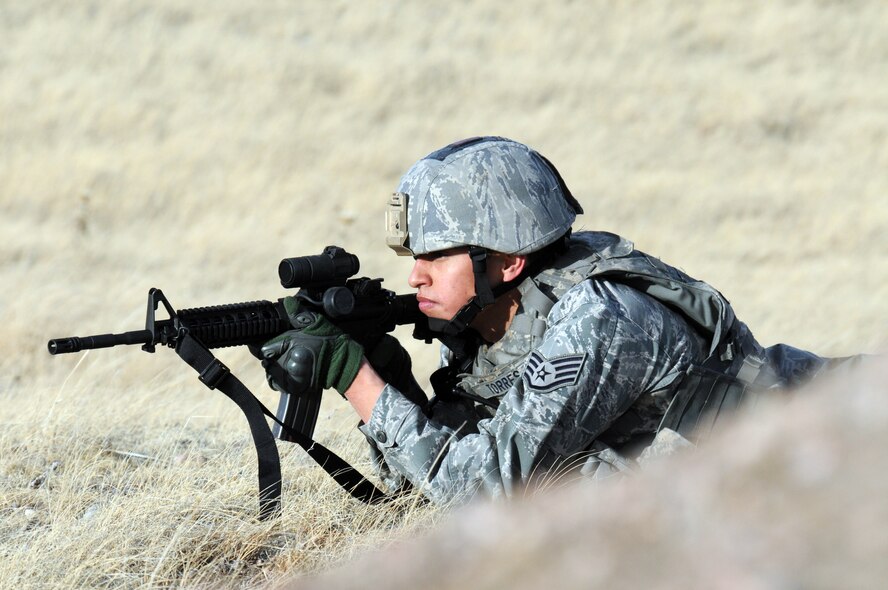Staff Sgt. Renaldo Torres, 790th MSFS, takes aim during an exercise here Thursday, Jan. 13, 2011. (U.S. Air Force photo by R.J. Oriez)
