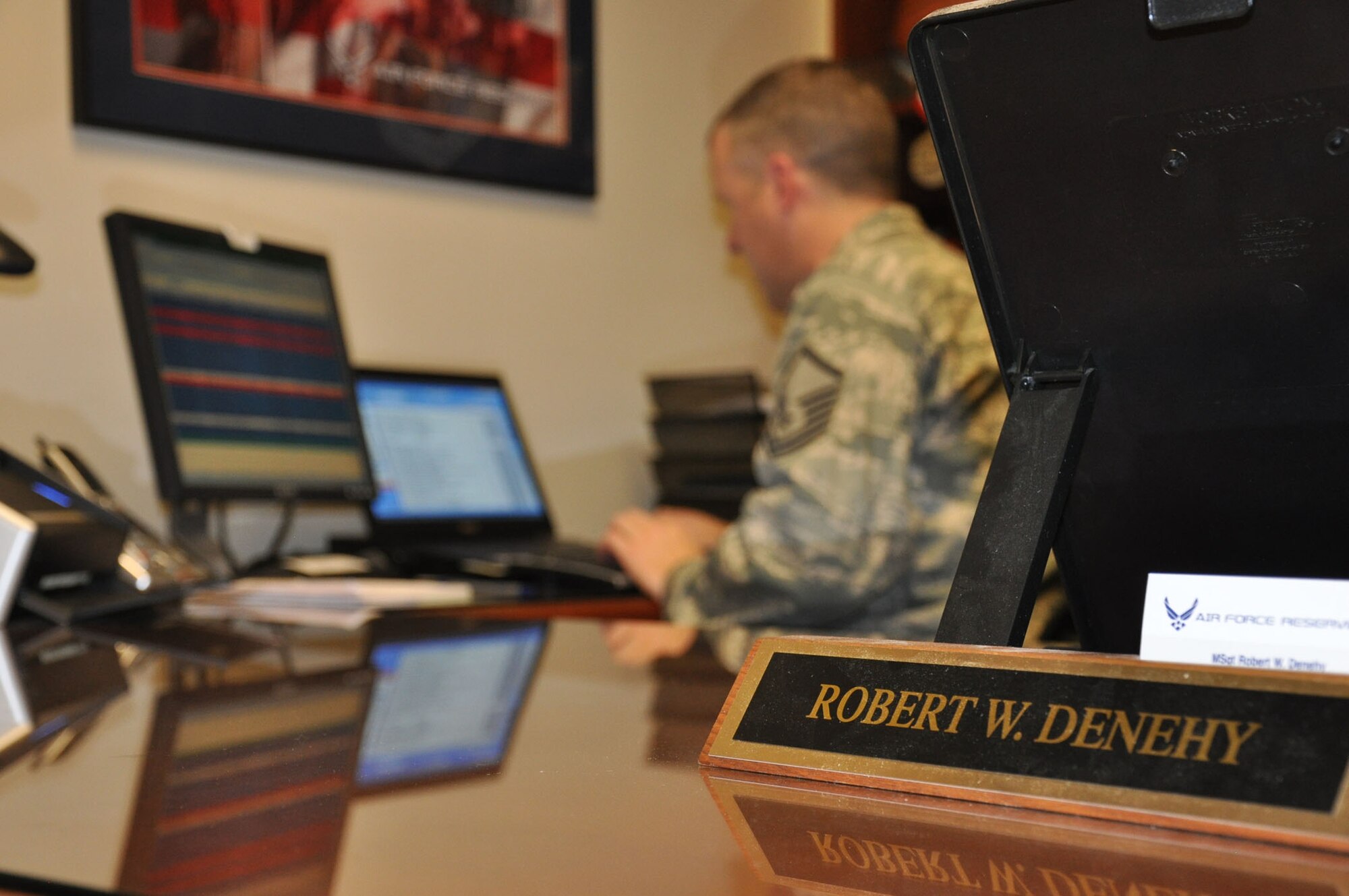 Master Sgt. Robert W. Denehy, in-service recruiter with the 315th Airlift Wing, stays in constant communication with personnel and prospective reservists for job opportunities within the wing. (U.S. Air Force photo/Senior Airman Robert Pilch)