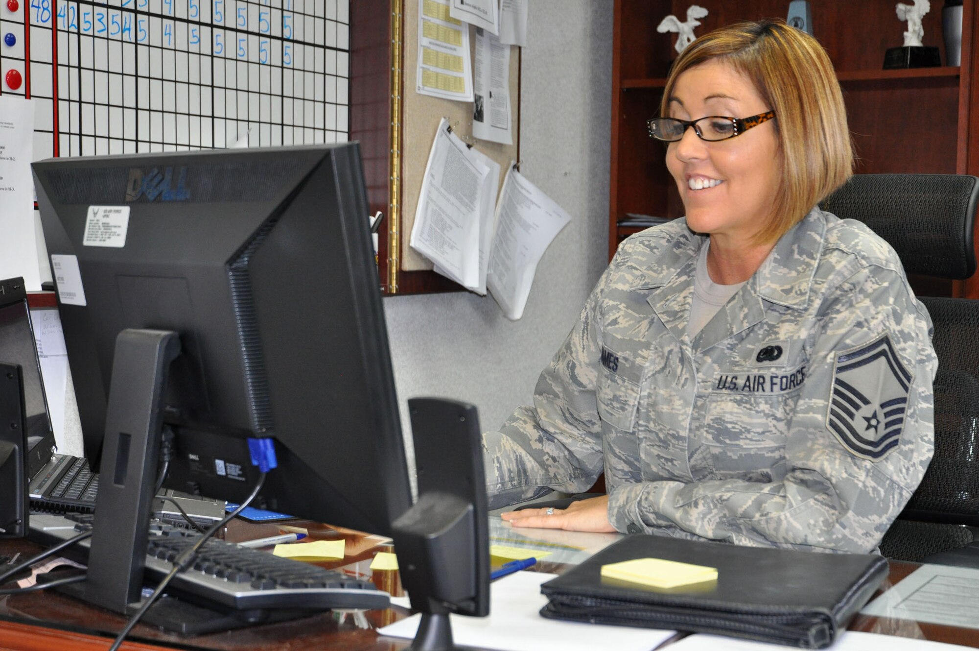 Senior Master Sgt. Valerie James, senior recruiter with the 315th Airlift Wing recruiting offce, reviews recruiting goals for 2011. Sergeant James leads and guides line-level recruiters while assisting potential recruits in joining the Air Force Reserve. (U.S. Air Force photo/Senior Airman Robert Pilch)