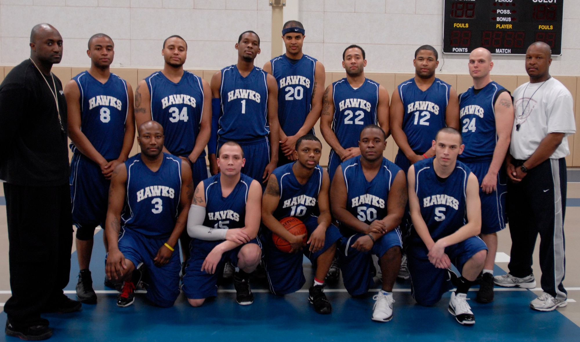 GOODFELLOW AIR FORCE BASE, Texas - Goodfellow Hawks, the base varsity basketball team members pose during a training session at Carswell Field House, Jan. 19. Anyone with a civilian or military ID can join the team. To join, call (325) 654- 4293 or email jamal.mikell@goodfellow .af.mil. (U.S. Air Force photo/Anne Gathua)

