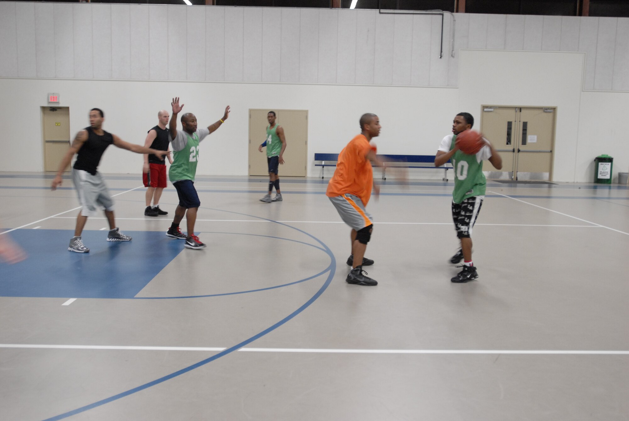 GOODFELLOW AIR FORCE BASE, Texas - Goodfellow Hawks, the base varsity basketball team, perform shooting and defensive drills during a training session at Carswell Field House, Jan. 19. Anyone with a civilian or military ID can join the team. To join, call (325) 654- 4293 or email jamal.mikell@goodfellow .af.mil. (U.S. Air Force photo/Anne Gathua)
