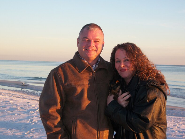 Master Sgt, Ryan Miller and his wife, Charity, pose for an informal photo in January 2010 on Fort Walton Beach, Fla. They met six years ago around Christmas. As it turned out, Sergeant Miller had known his wife’s mother for years and said it was like he was part of the family long before the couple decided to marry in 2005. (Photo provided)