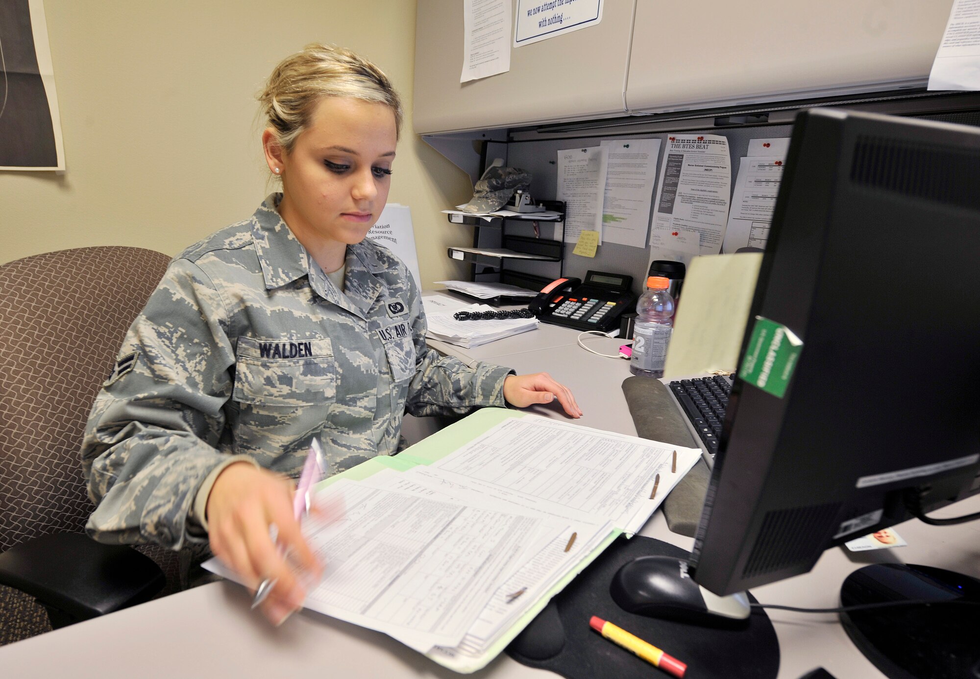 Airman 1st Class Jamie Walden, an aviation resource manager with the 2nd Operations Support Squadron, inputs information into the aviation resource management system in the Host Aviation Resource Management office on Barksdale Air Force Base, La., Jan. 19. The HARM office makes sure all aircrew are physically qualified, keeps track of all flight record folders, logs flight times, awards ratings and badges, gives flight record reviews, publishes aeronautical orders and in/out processes all flyers and jumpers on base. (U.S. Air Force photo/Senior Airman Chad Warren)(RELEASED)