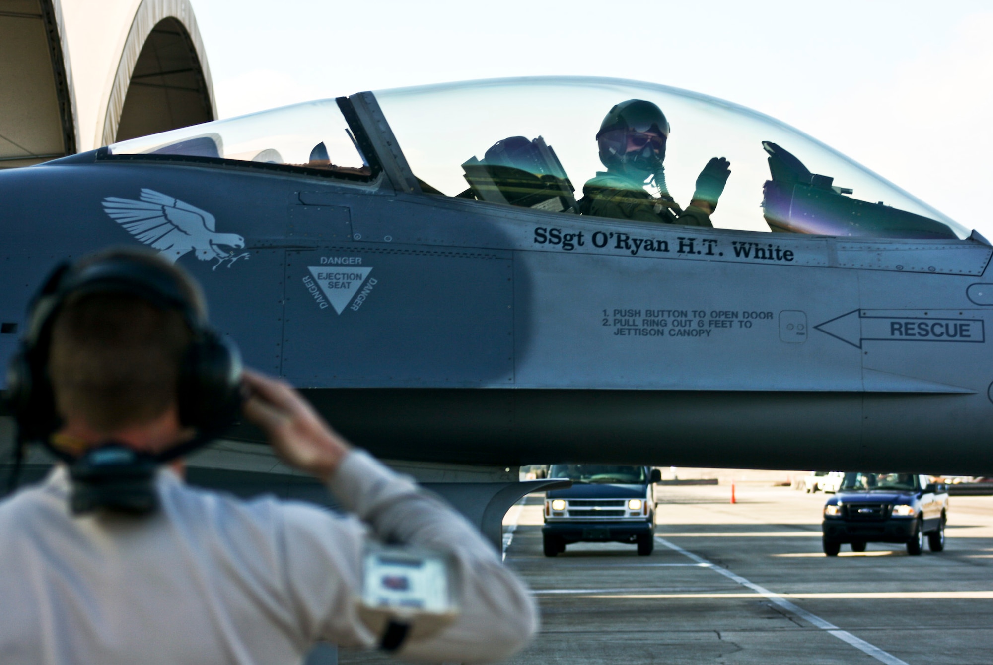 Airman 1st Class Christopher Herpstreith, 56th Aircraft Maintenance Squadron crew chief, salutes Maj. Matthew Renbarger, 58th Fighter Squadron deputy of operations, as he taxis out on the first sortie for the 33rd Fighter Wing at Eglin Air Force Base, Fla., Jan. 18.  The mission was a long-time coming for the former F-15 wing that transitioned to the DoD’s first F-35 training wing in October 2009.  (U.S. Air Force photo/2nd Lt. Andrew Caulk)   