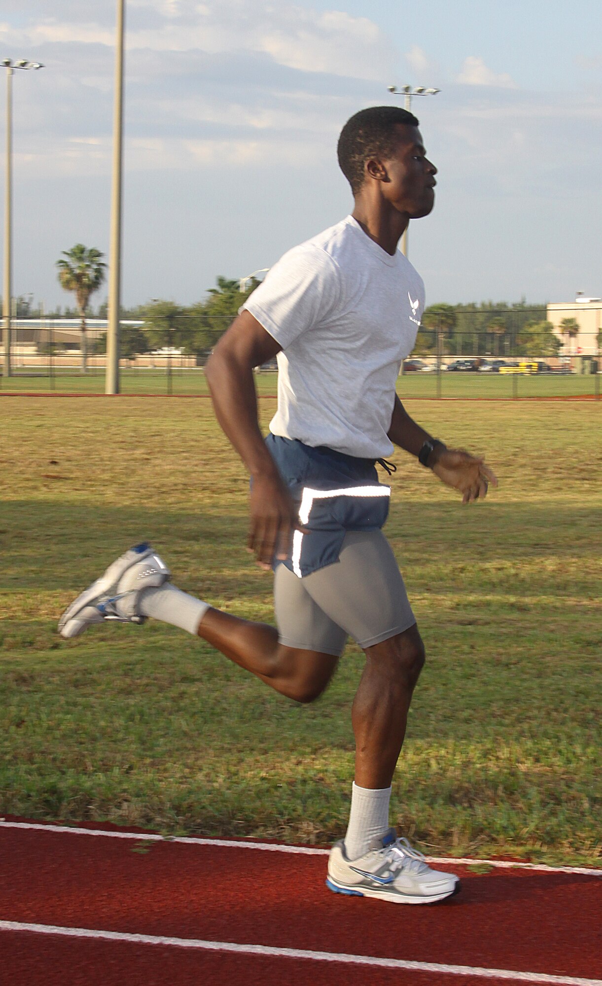 Staff Sgt. Pierre Narcisse, 482nd Fighter Wing Assistant Chief of Career Development, runs the Homestead Air Reserve Base track. Staff Sgt. Narcisse said he trains regularly and always scores well on his physical training test. (U.S. Air Force photo/Airman 1st Class Jacob Jimenez)