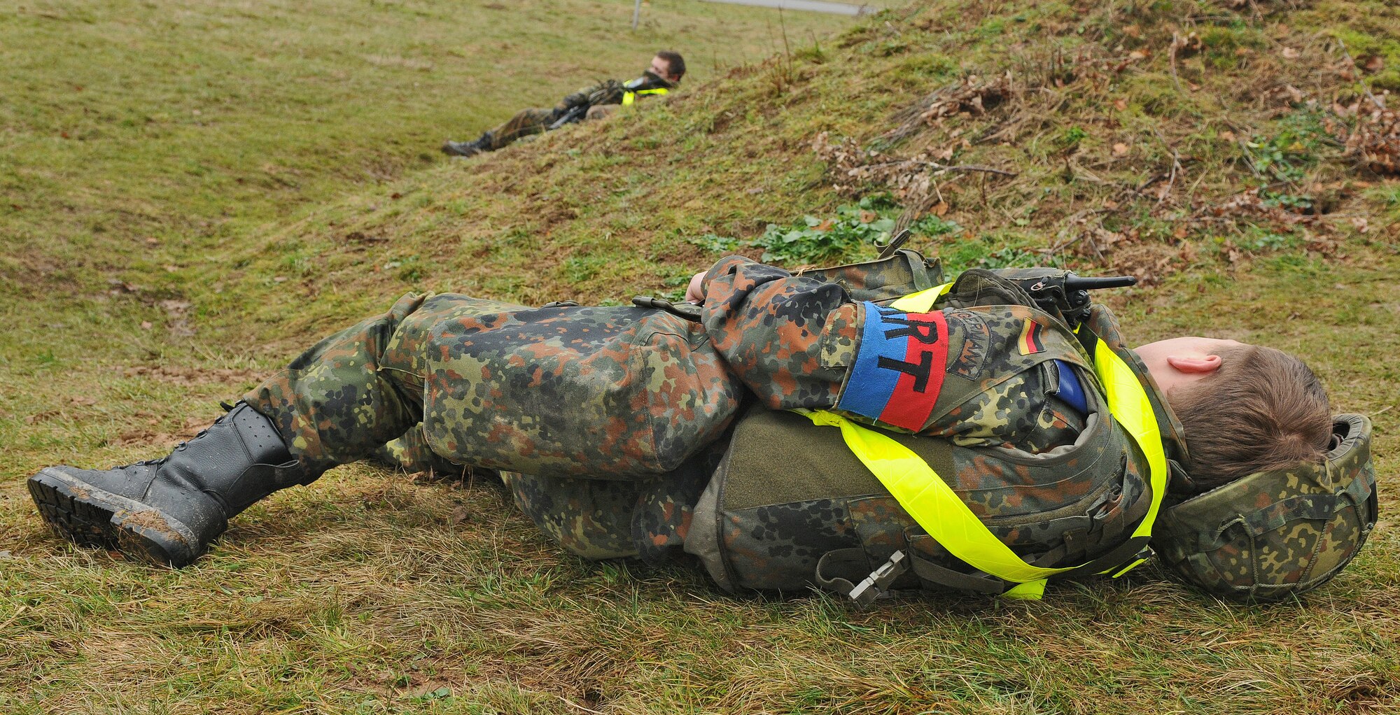SPANGDAHLEM AIR BASE, Germany – German air force custody forces augmentees await reinforcements from other members in their flight during a joint force recapture and recovery exercise Jan. 18. The exercise simulated a combat area of responsibility and tested German air force members’ ability to perform and operate in a real-world war zone. (U.S. Air Force photo/Senior Airman Nick Wilson)