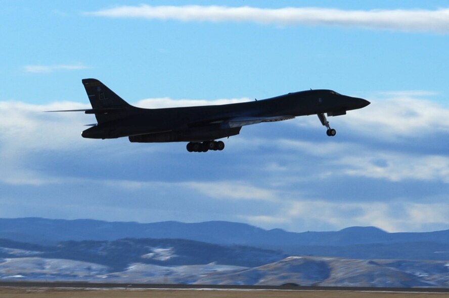 A B-1B Lancer takes off at Ellsworth Air Force Base, S.D., Jan. 19, 2011. The B-1 can rapidly deliver massive quantities of precision and non-precision weapons against any adversary, anywhere in the world. (U.S. Air Force photo/Senior Airman Kasey Close) 
