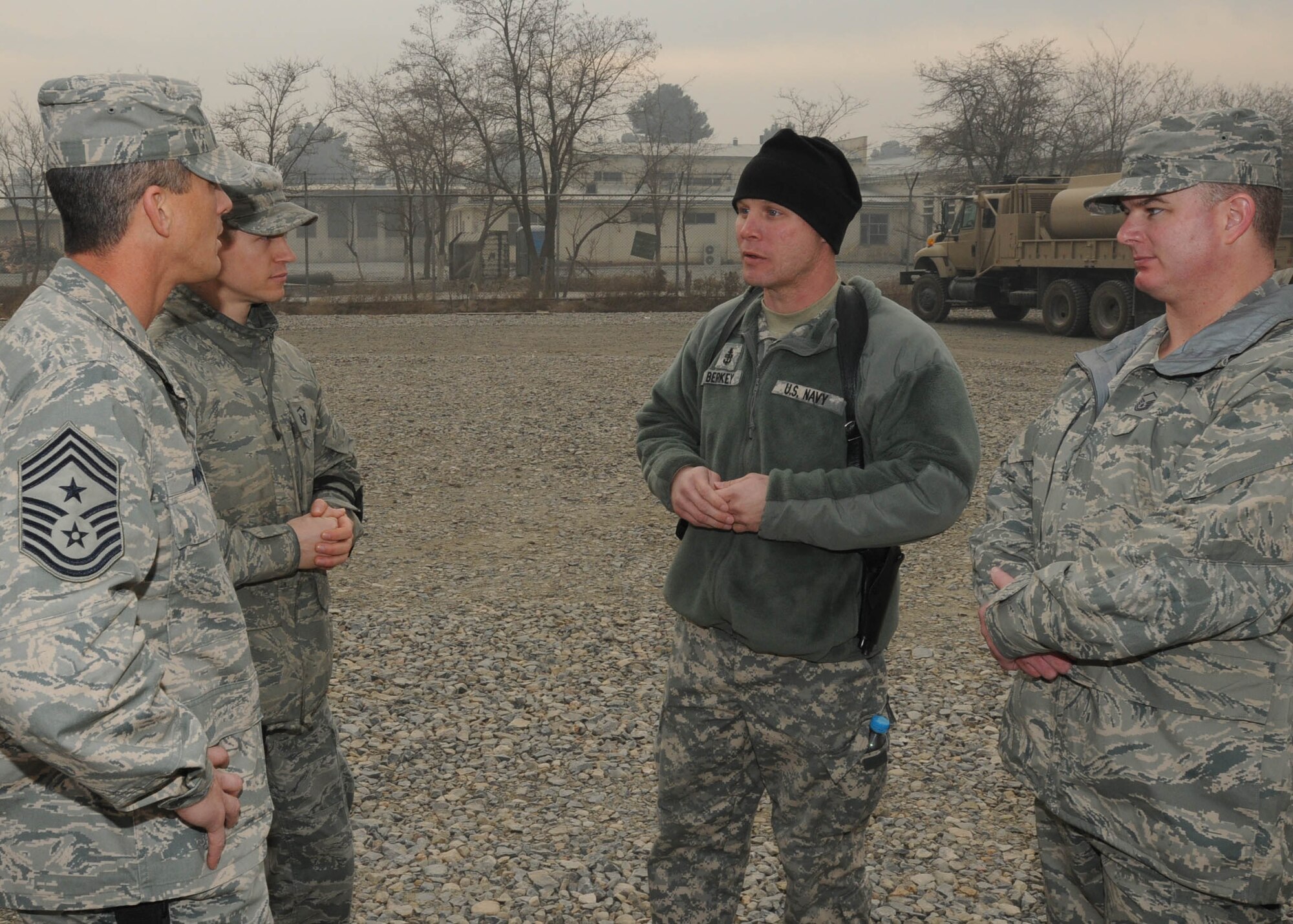 KABUL, Afghanistan - Command Chief Master Sgt. Richard Parsons, U.S. Air Forces Central, speaks to advisers from the Afghan Air Force "Big Air School" also known as Pohantoon-e-Hawaye, during his tour of NATO Air Training-Afghanistan/438th Air Expeditionary installations at the Afghan Air Force base in Kabul, Afghanistan, Jan. 19, 2011. During his visit, Chief Parsons met with Airmen from the 438th Air Expeditionary Wing to get to know them and their mission. (U.S. Navy photo by Mass Communications Specialist 3rd Class Petty Officer Jared E. Walker/ RELEASED).